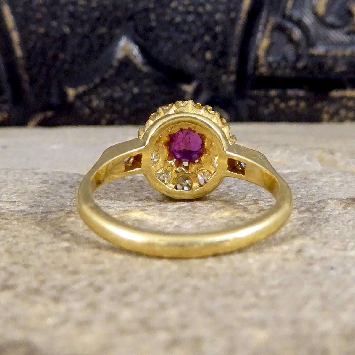 Late Victorian Ruby and Diamond Cluster Ring with Diamond Set Shoulders in 18ct In Good Condition For Sale In Yorkshire, West Yorkshire