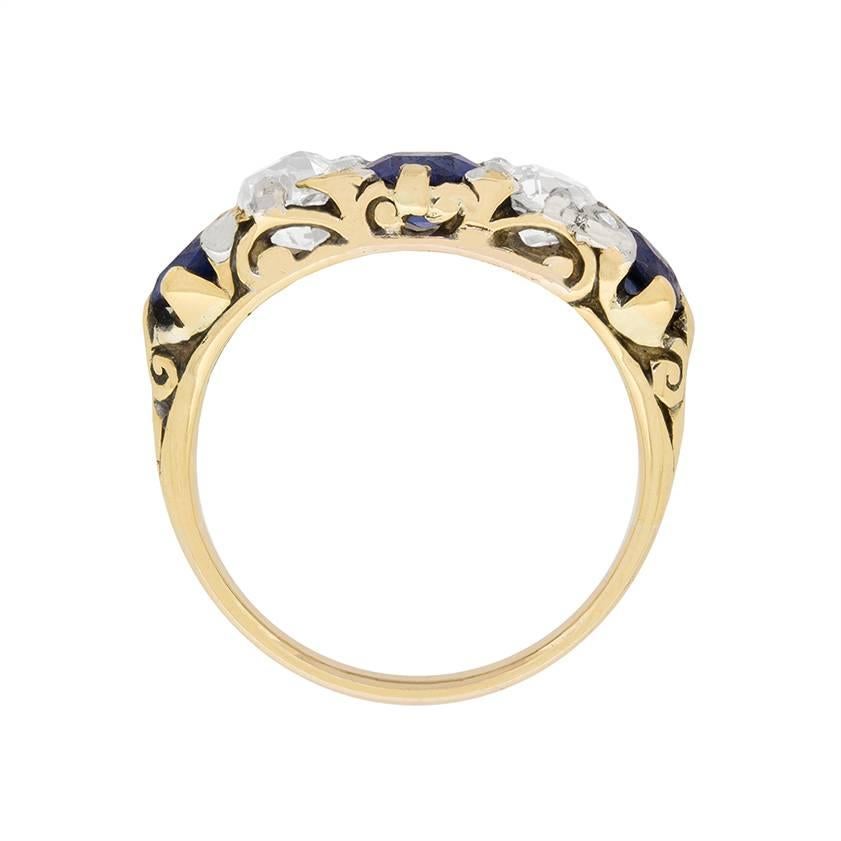 This five stone ring has 3 beautifully deep blue sapphires, complimented by two lovely old cut diamonds. The sapphires have a combined weight of 1.85 carat, and the diamonds 1.20 carat. In between each stone, you also have two rose cuts diamonds,