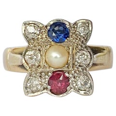 Antique Late Victorian Sapphire, Ruby, Pearl and Diamond 18 Carat Gold Panel Ring