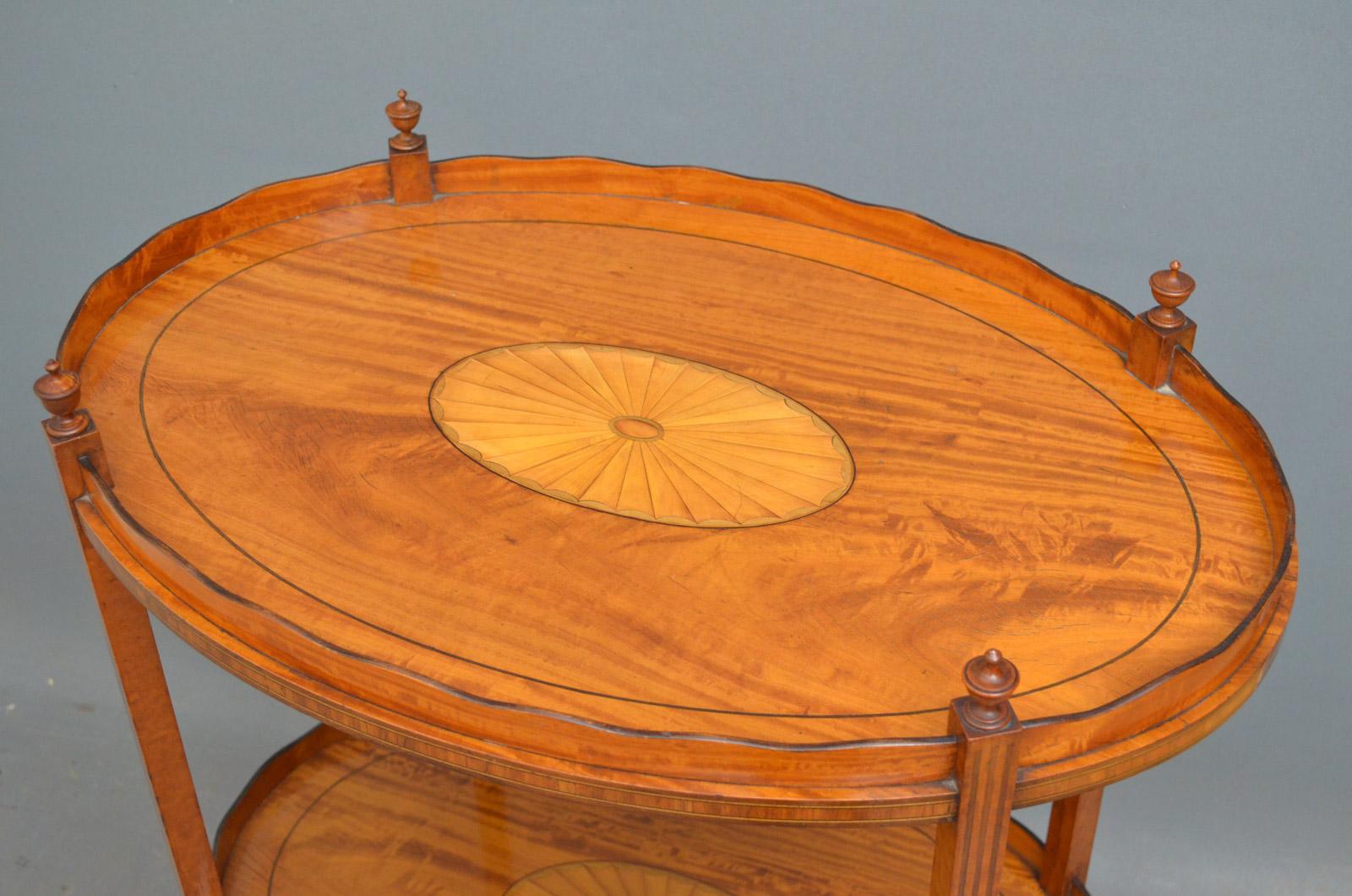 Sn4484, late Victorian satinwood tray table of oval form with two-tier decorated with sunburst inlays and solid shaped gallery with turned finials, standing on slender, string inlaid legs, all in wonderful original condition throughout, circa