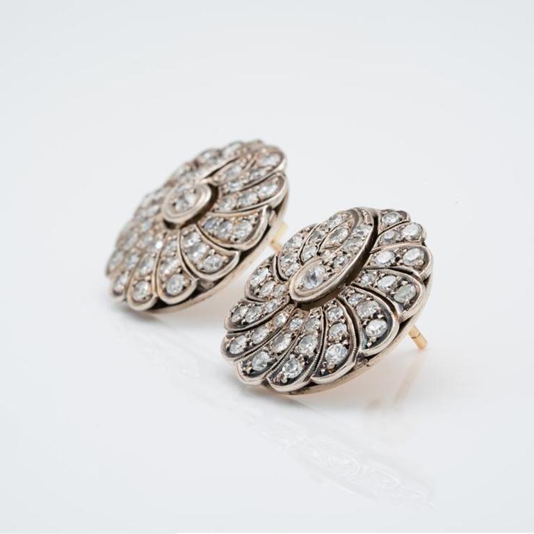 Late Victorian Silver and 14k Yellow Gold and 2.5ct Old European Cut Paisley Cluster Earrings c.1900

Additional Information:
Period: Victorian
Year: c.1900
Material: 14k Yellow Gold and Diamond
Closure: 14k Yellow Gold Post
Weight: 10.33g
Diameter: