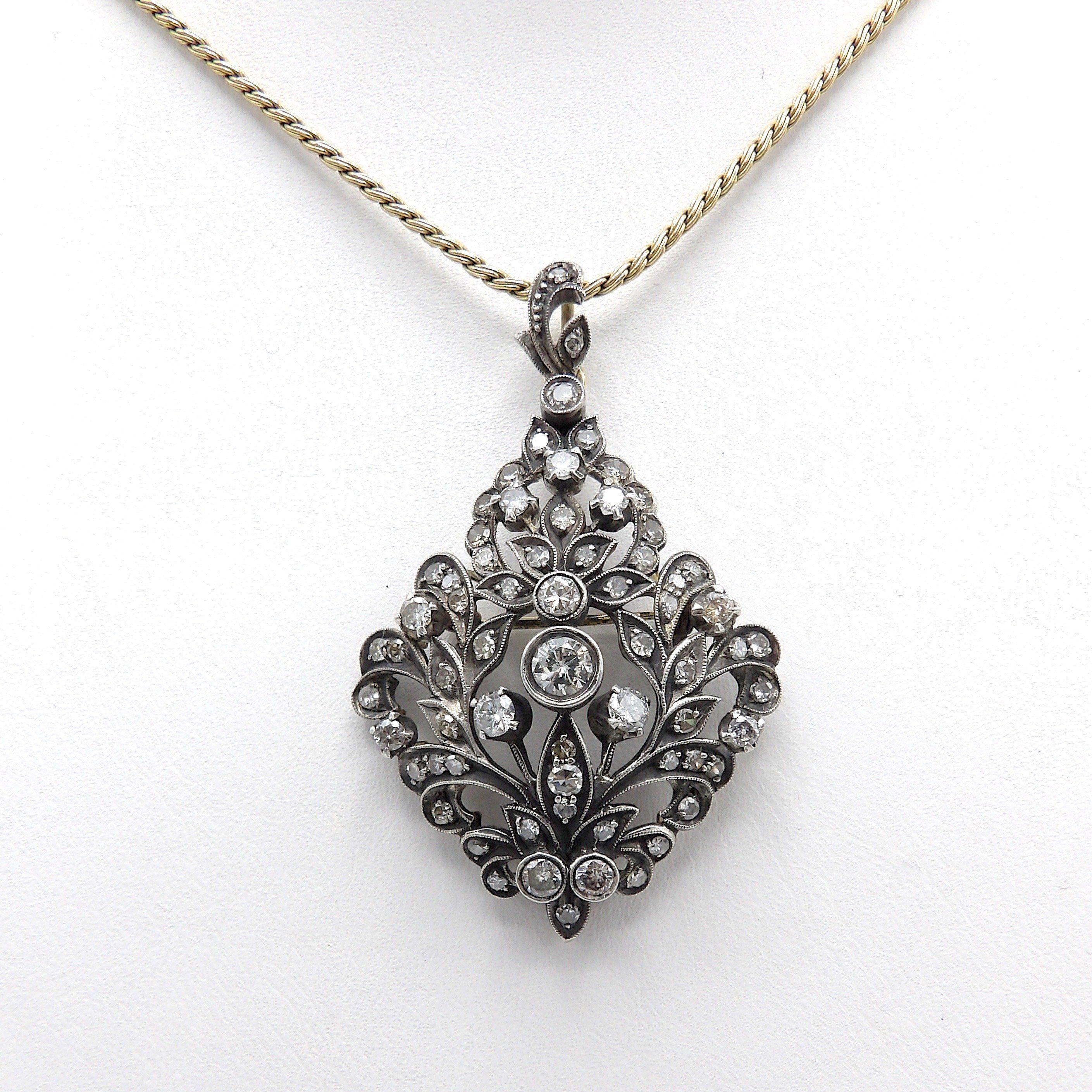 Late Victorian Sterling Silver and 12K Gold Diamond Pendant Brooch In Good Condition For Sale In Venice, CA