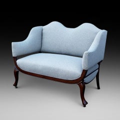 Late Victorian Upholstered Mahogany Camel Back Settee