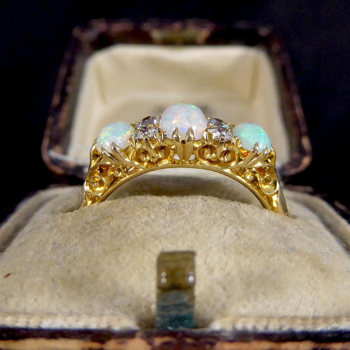 Late Victorian Vibrant Opal Three Stone Ring with Diamond Spacers in 18ct Gold 2