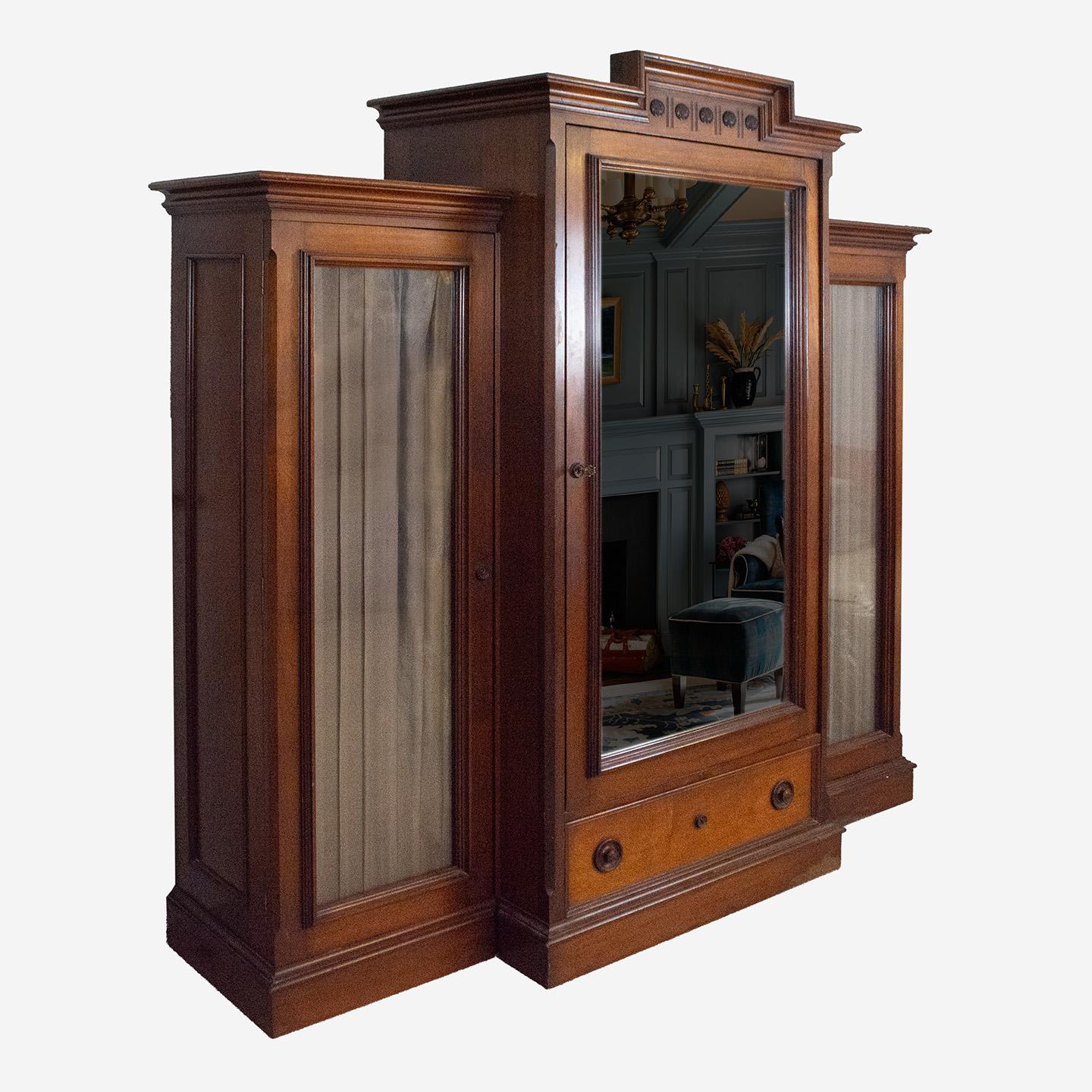 Offering a stunning antique wardrobe with solid joints and hand-cut dovetail work, dating to the late Victorian period, circa 1900. Superior proportion and appearance with walnut fine grain and deep beautiful hues. There are 11 internal drawers