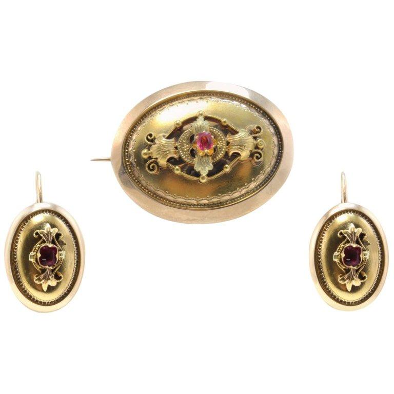 Late Victorian Yellow Gold and Ruby Brooch and Earrings For Sale