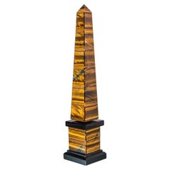 Escultura obelisco lateranense de ojo de tigre y obsidiana de Obsydian Stone