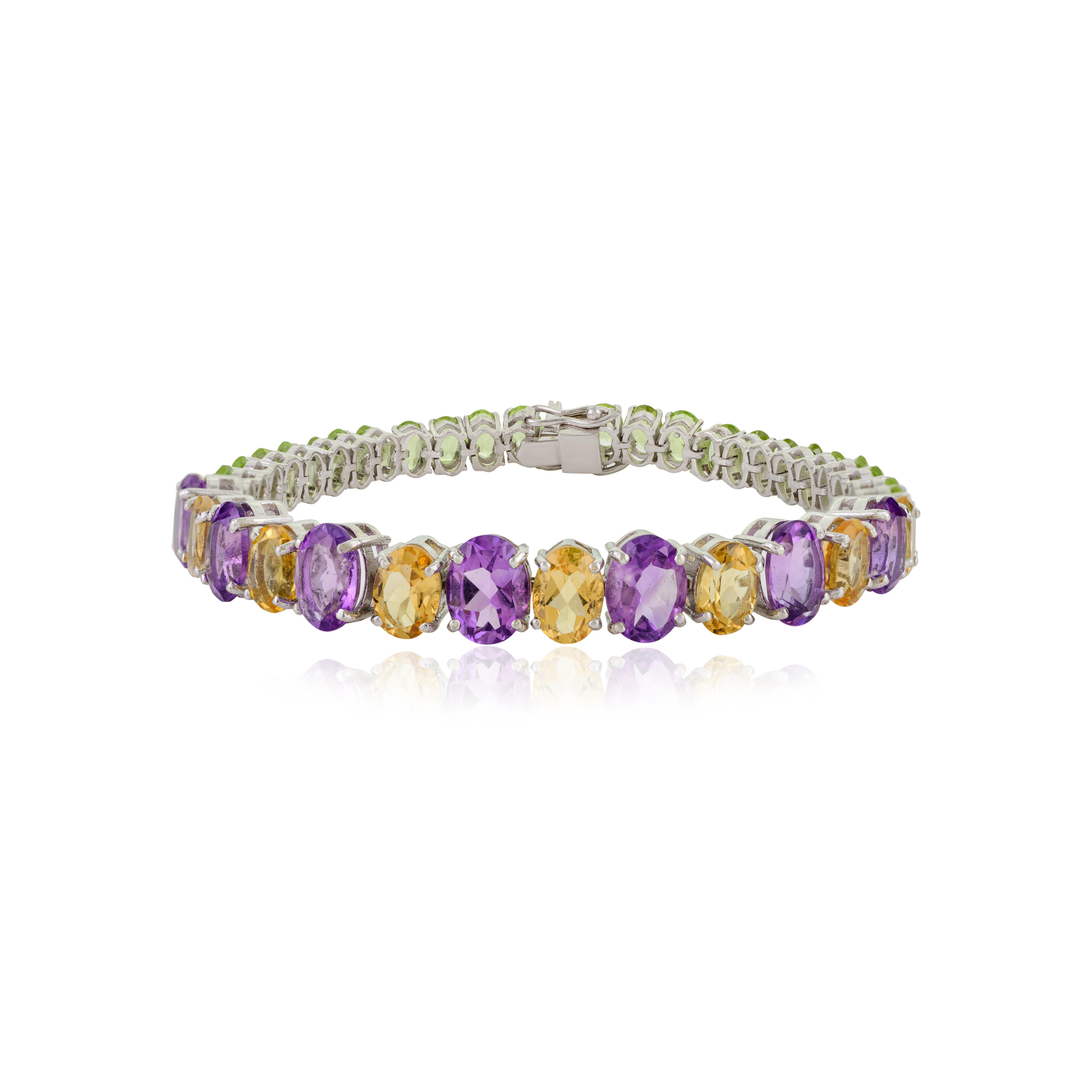 Una maravillosa y natural pulsera tenis multigemas! Elaborada en plata de ley 925, una vívida colección de gemas naturales Amatista, Peridoto y Citrino. Cada gema se ha seleccionado cuidadosamente por su riqueza de color y claridad. Esta pulsera