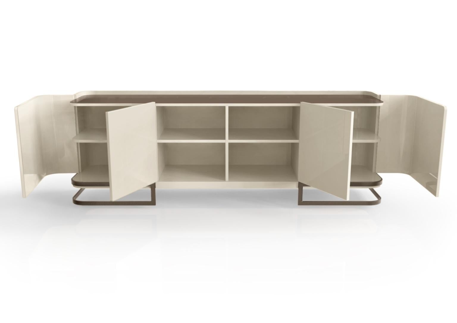 Modern Latte Lacquered High Gloss Cream Sideboard by Caffe Latte

A Modern Latte Lacquered High Gloss Cream Sideboard by Caffe Latte, with strong lines and a firm personality, versatile, functional, and smooth, latte is lacquered in high gloss cream