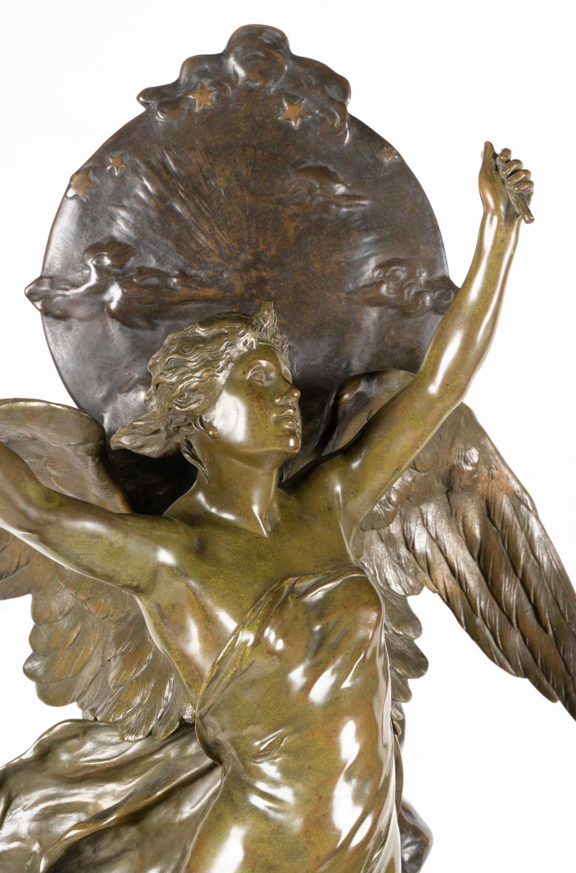 Alluring patinated bronze sculpture by Émile Louis Picault depicting an allegorical figure, a classically draped winged woman, gracefully extending into the air with arms raised. A small plaque depicting clouds and stars create a visual illusion