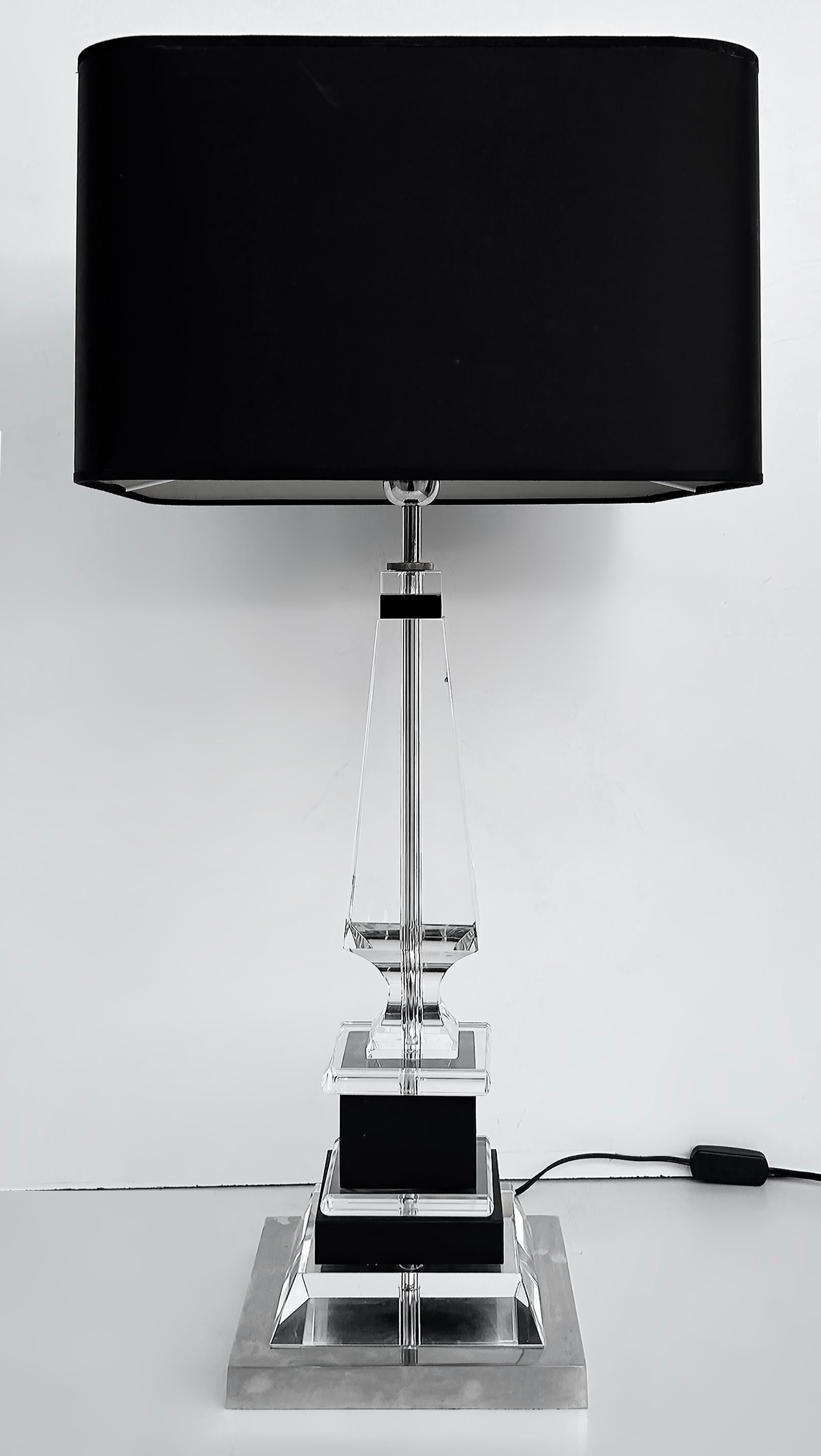 Laudarte SRL Crystal, Chrome, Wood Table Lamps, Pair from Milano, Italy 

Offered for sale is a pair of  Italian crystal, chrome and lacquered wood table lamps manufactured by Laudarte SRL Milano, Italy.  The lamps include the shades.  They are