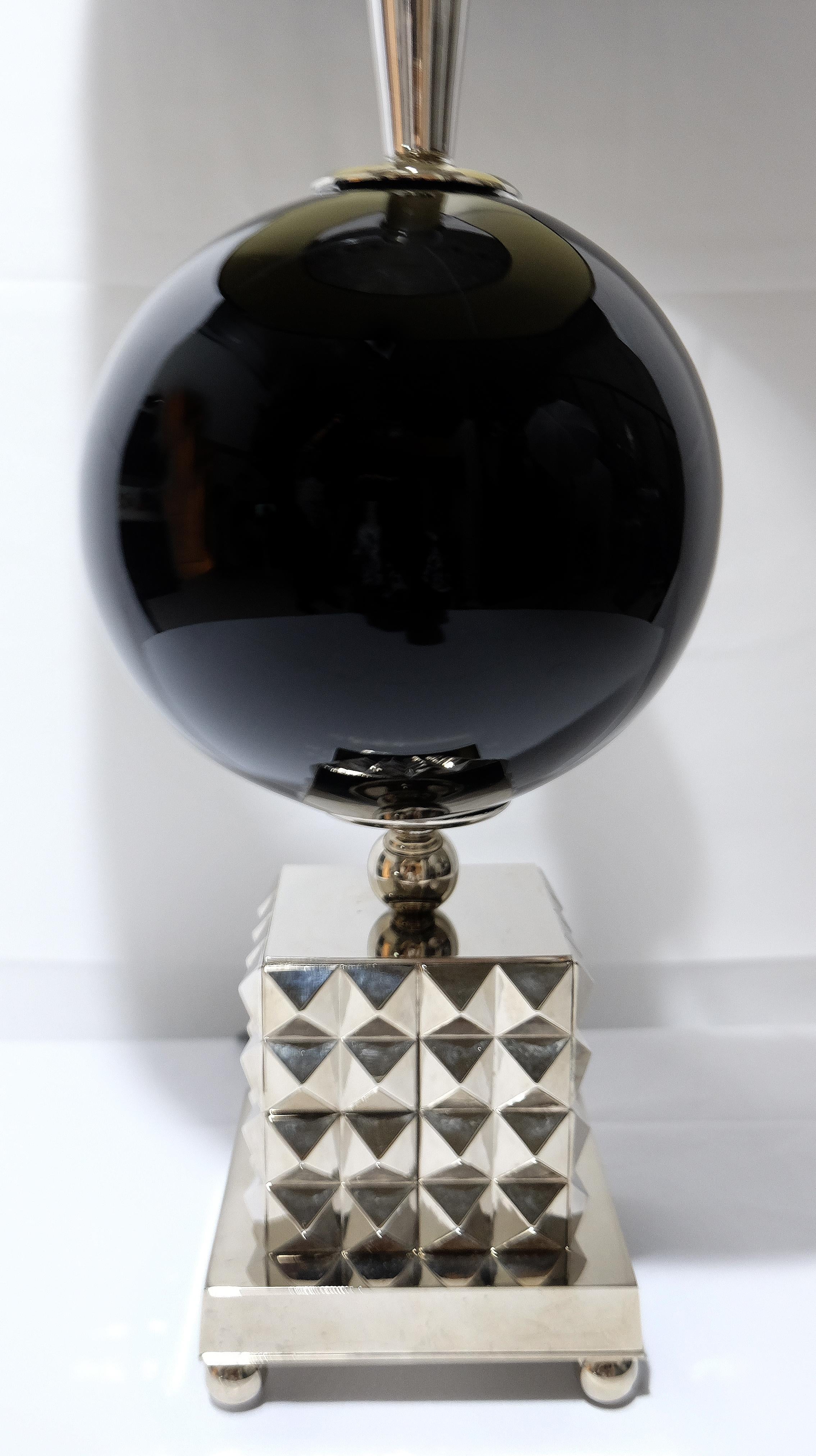 Laudarte Srl Lume Yago Table Lamp in Nickel and Glass, pair Available

Offered for sale is a stunning black glass table lamp from Leo Mirai Collezione of Laudarte Srl with a nickel finish.
The Leo Mirai Collection grew from the prestigious