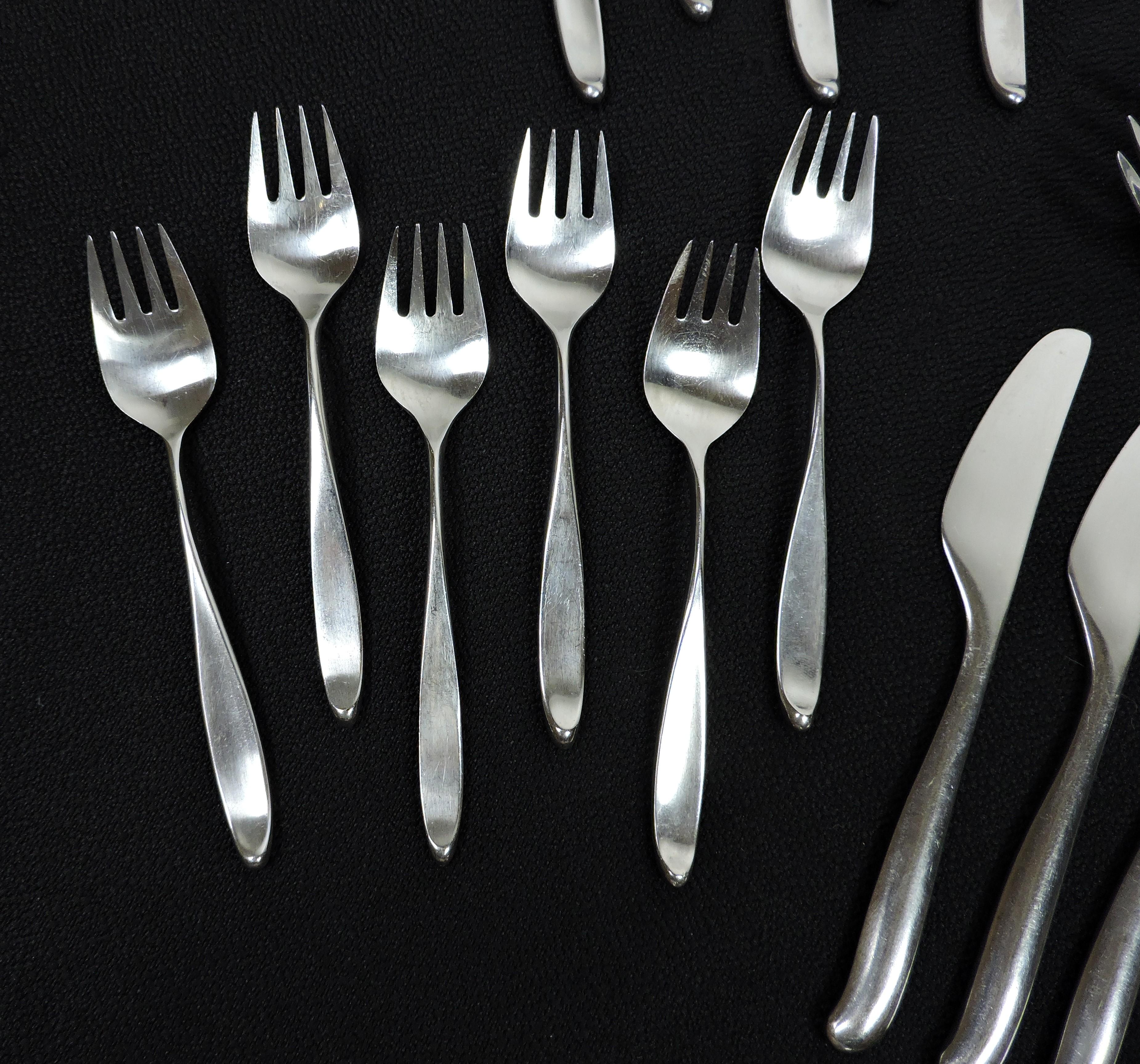 Beautiful 38 piece, service for six, stainless steel flatware set in the Design 2 pattern manufactured by Lauffer. Originally designed in 1956 by the American industrial designer Don Wallance, it has a timeless look that will never go out of style.
