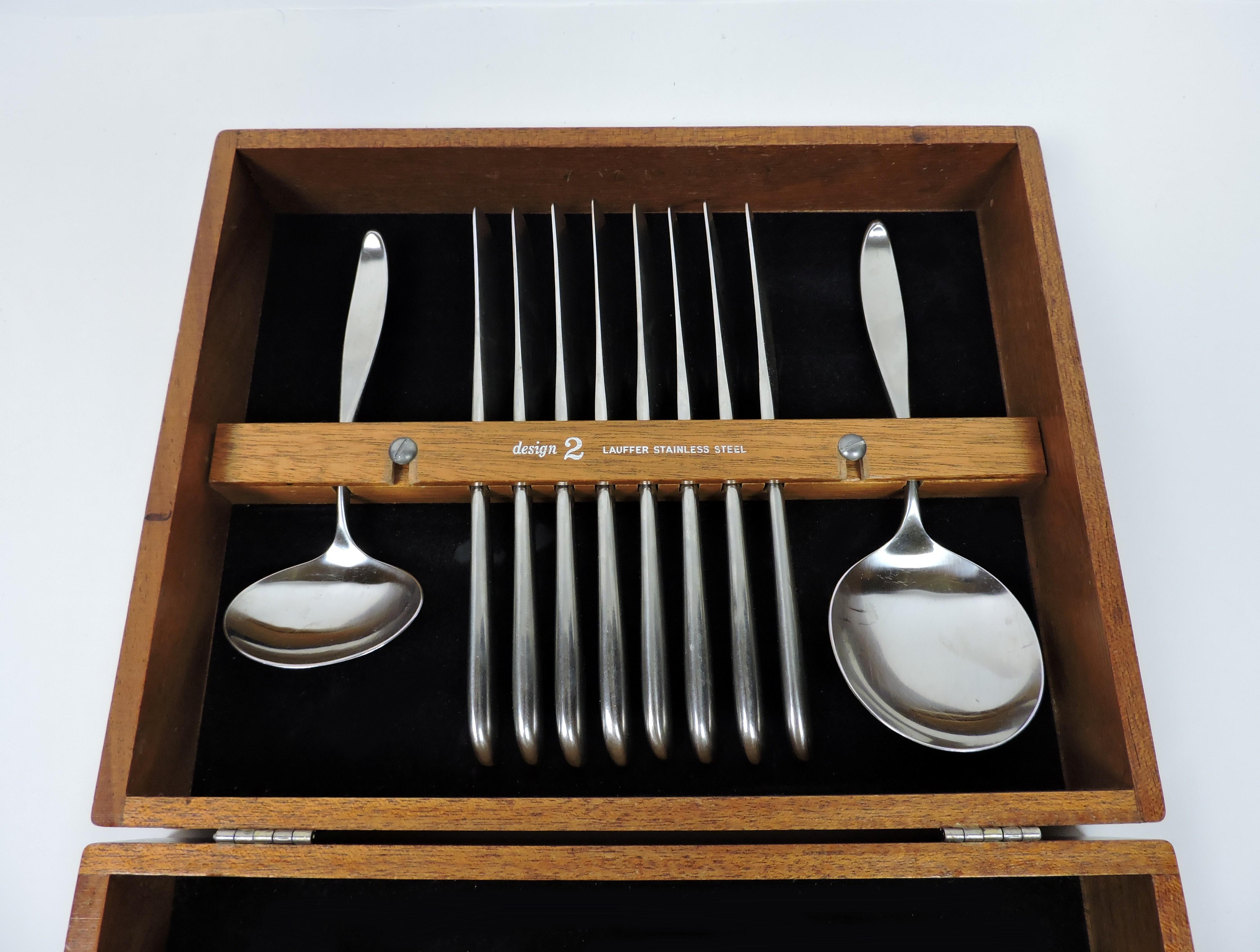 Beautiful 42 piece, service for eight, stainless steel flatware set in the Design 2 pattern manufactured by Lauffer. Originally designed in 1956 by the American industrial designer Don Wallance, it has a timeless look that will never go out of