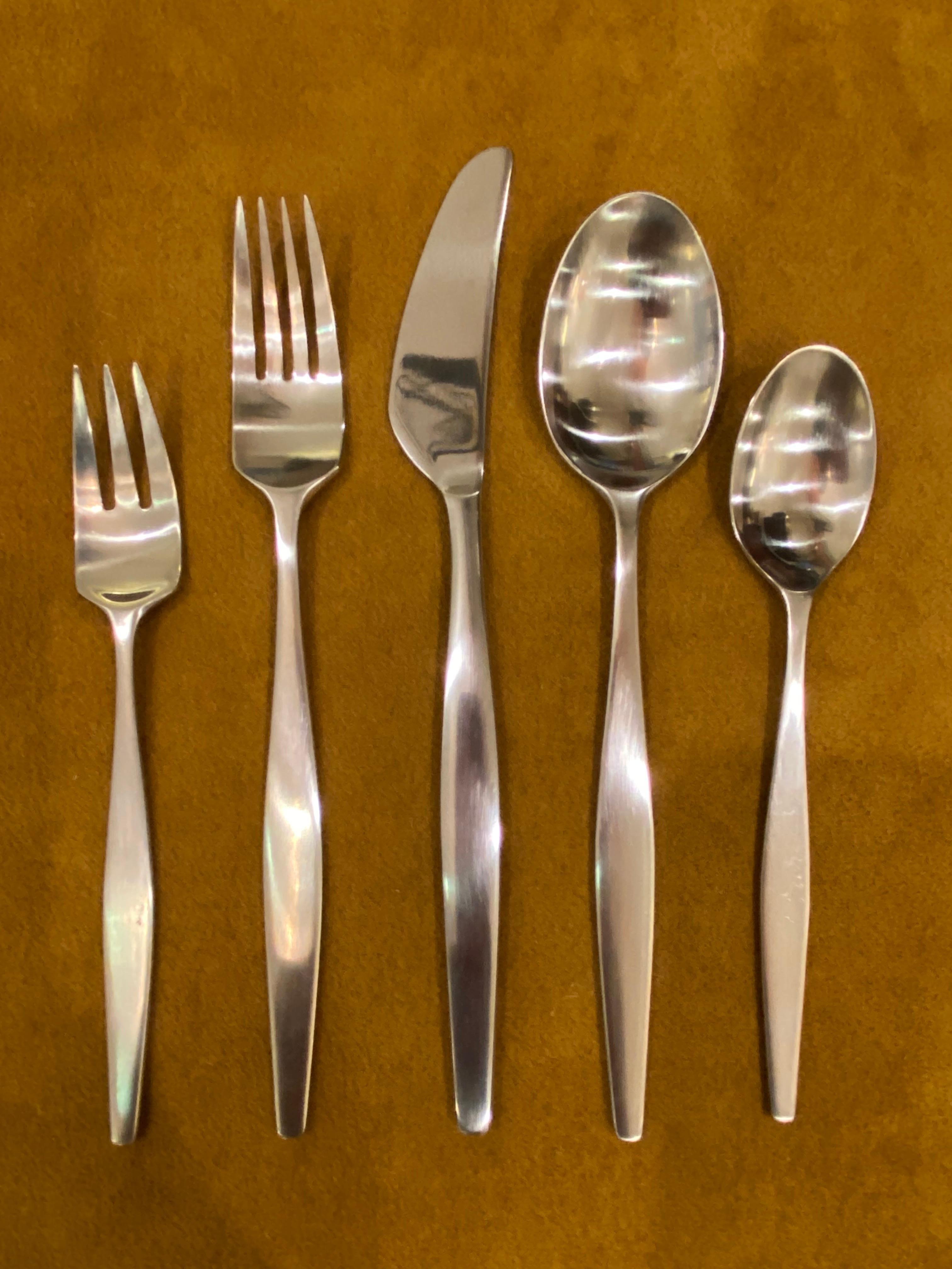 Lauffer Stainless Steel Flatware Set.  Vantage Pattern Service for 10 plus 1 large Serving Spoon and extras!  Most of this set is new and unused, still in plastic sleeves.  Teaspoons are the only pieces that appear with any wear.  Nice Large Set! 