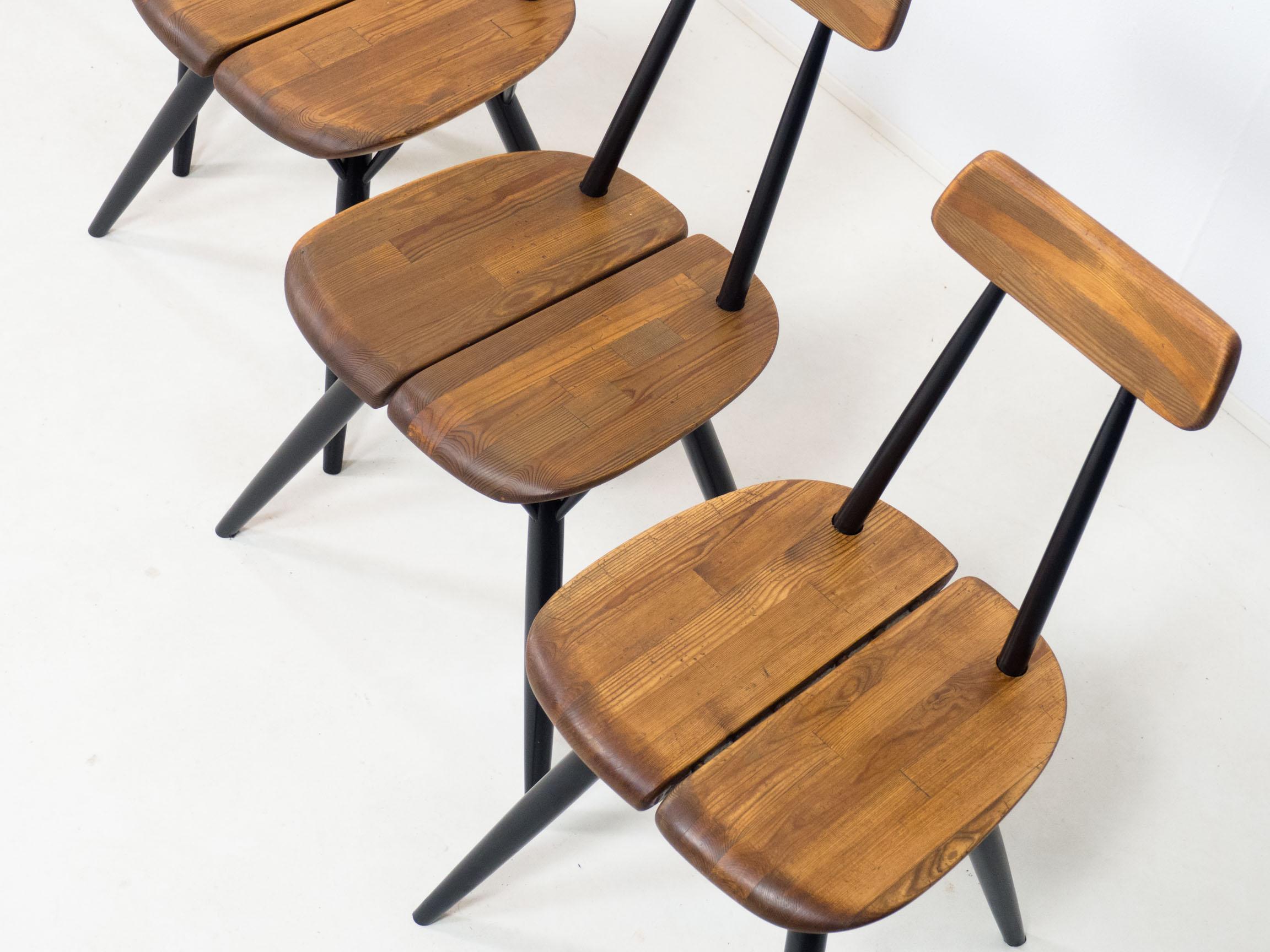 Mid-Century Modern Laukaan Puu set of four ‘Pirkka’ dining chairs – Ilmari Tapiovaara For Sale