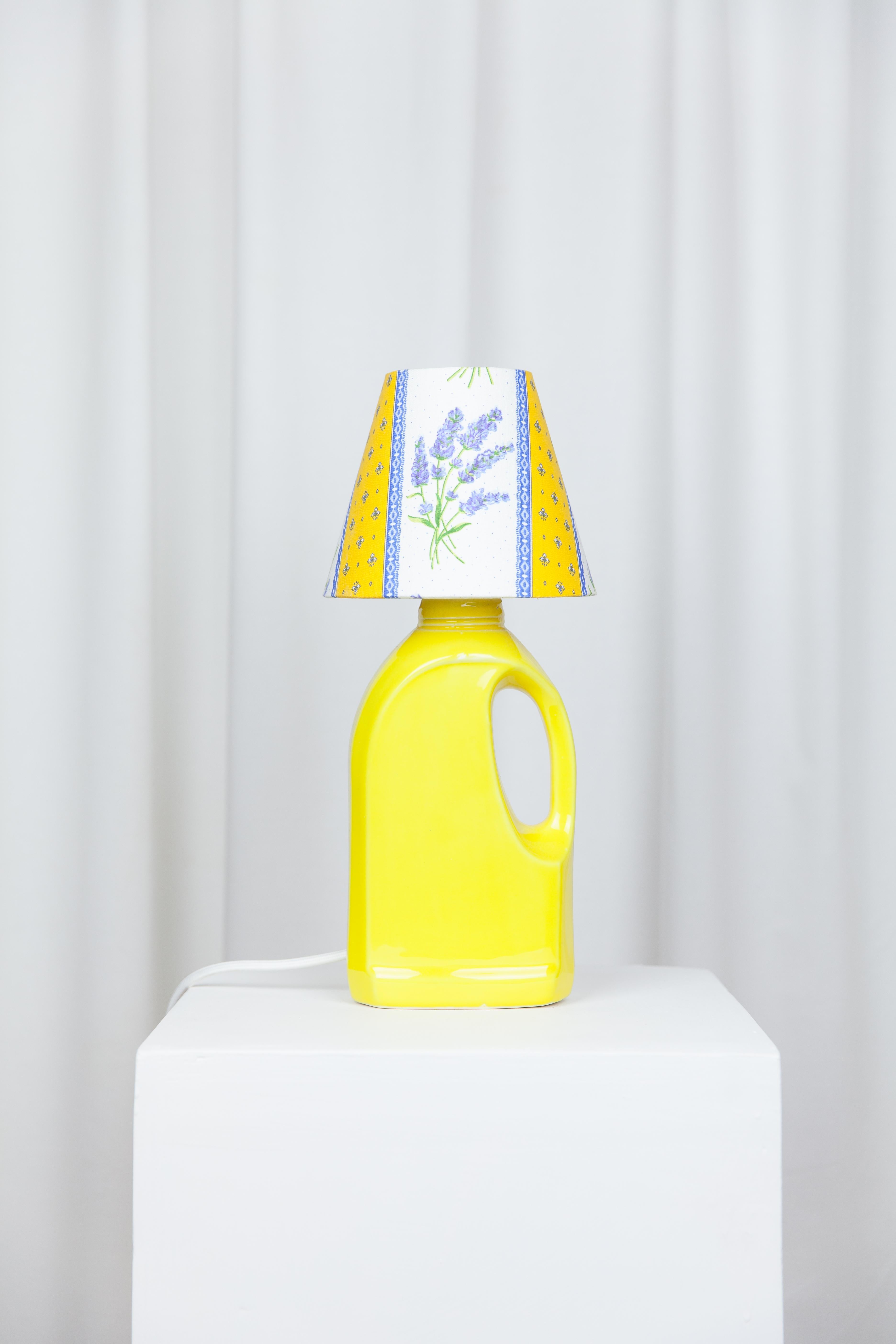 Laundry yellow lamp by Lola Mayeras
Dimensions: D15 x W 15 x W 35 cm
Materials: Earthenware.

Lamp in white earthenware, glazed in yellow.
This piece is designed and handcrafted in the south of France.

All our lamps can be wired according to