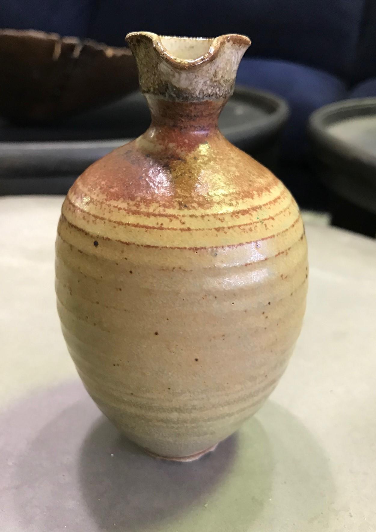 A splendid wonderfully glazed and designed gem of a vase by renowned American potter Laura Andreson. 

Signed on the base by Andreson.

Would be a great addition to any midcentury ceramics collection or a very eye-catching stand-alone
