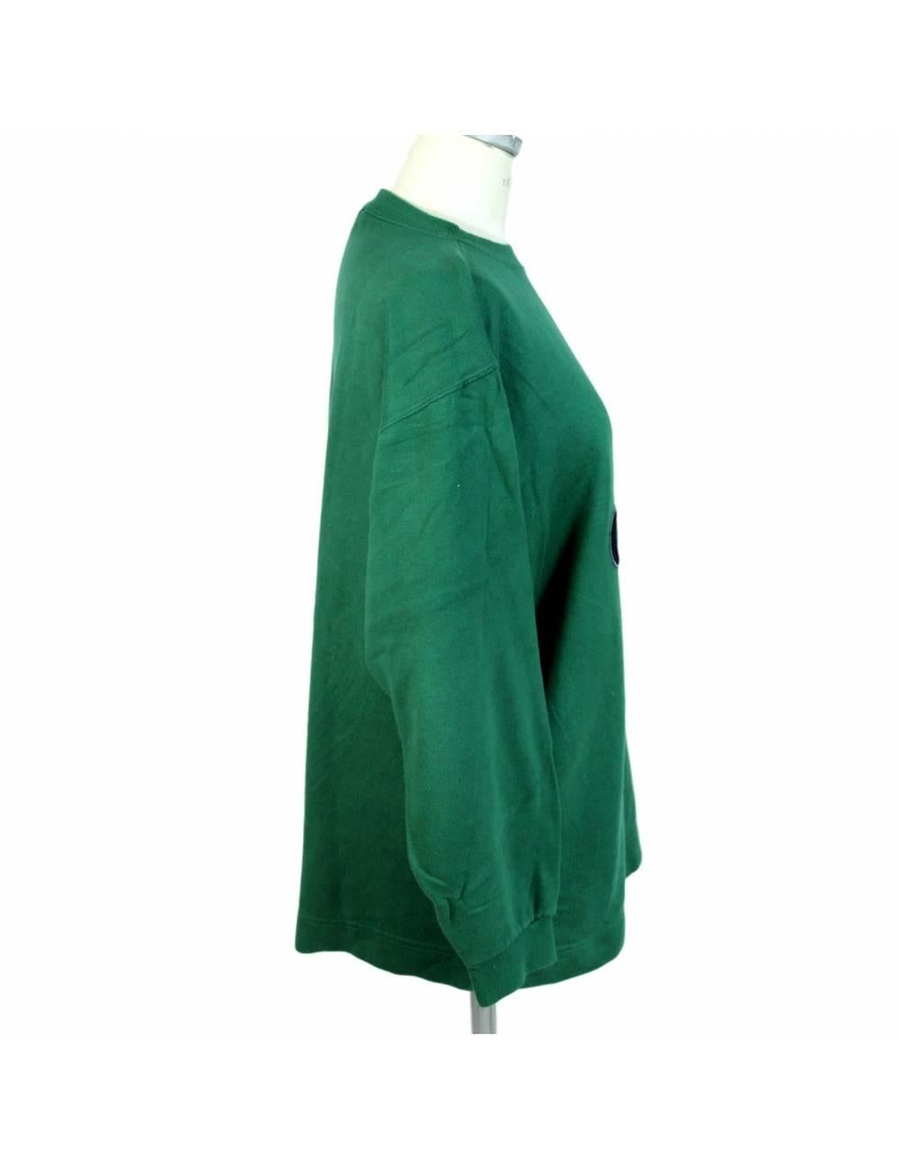 Vintage cotton sweater by Italian designer Laura Biagiotti, golf collection.

The green sweater has a print on the chest with the word 