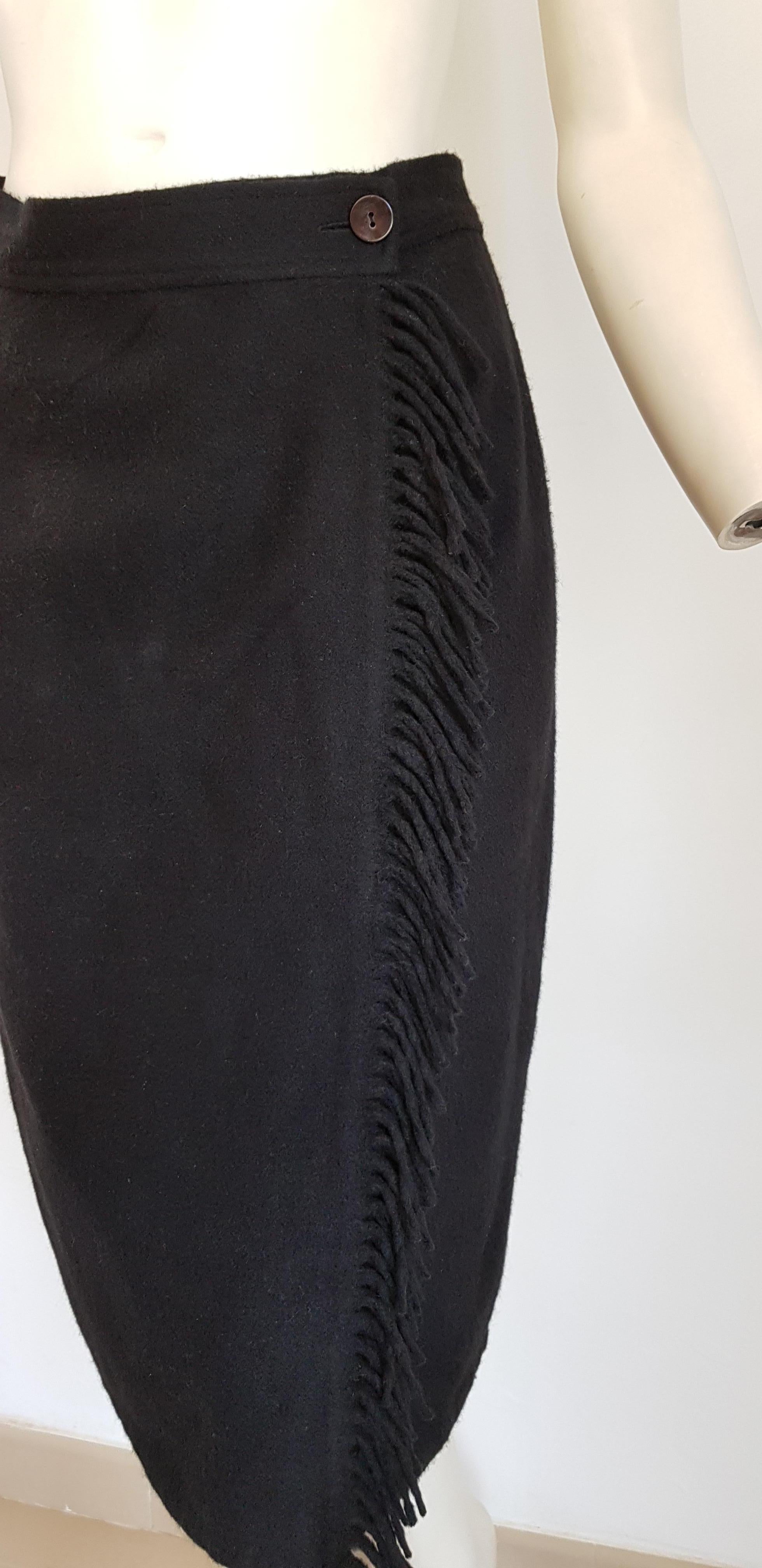 Laura BIAGIOTTI Cashemere Black Skirt Fringes Vertical Opening - Unworn, New.

SIZE: equivalent to about Small / Medium, please review approx measurements as follows in cm.  SKIRT: lenght 65, waist circumference 72, hip circumference 99. 
TO