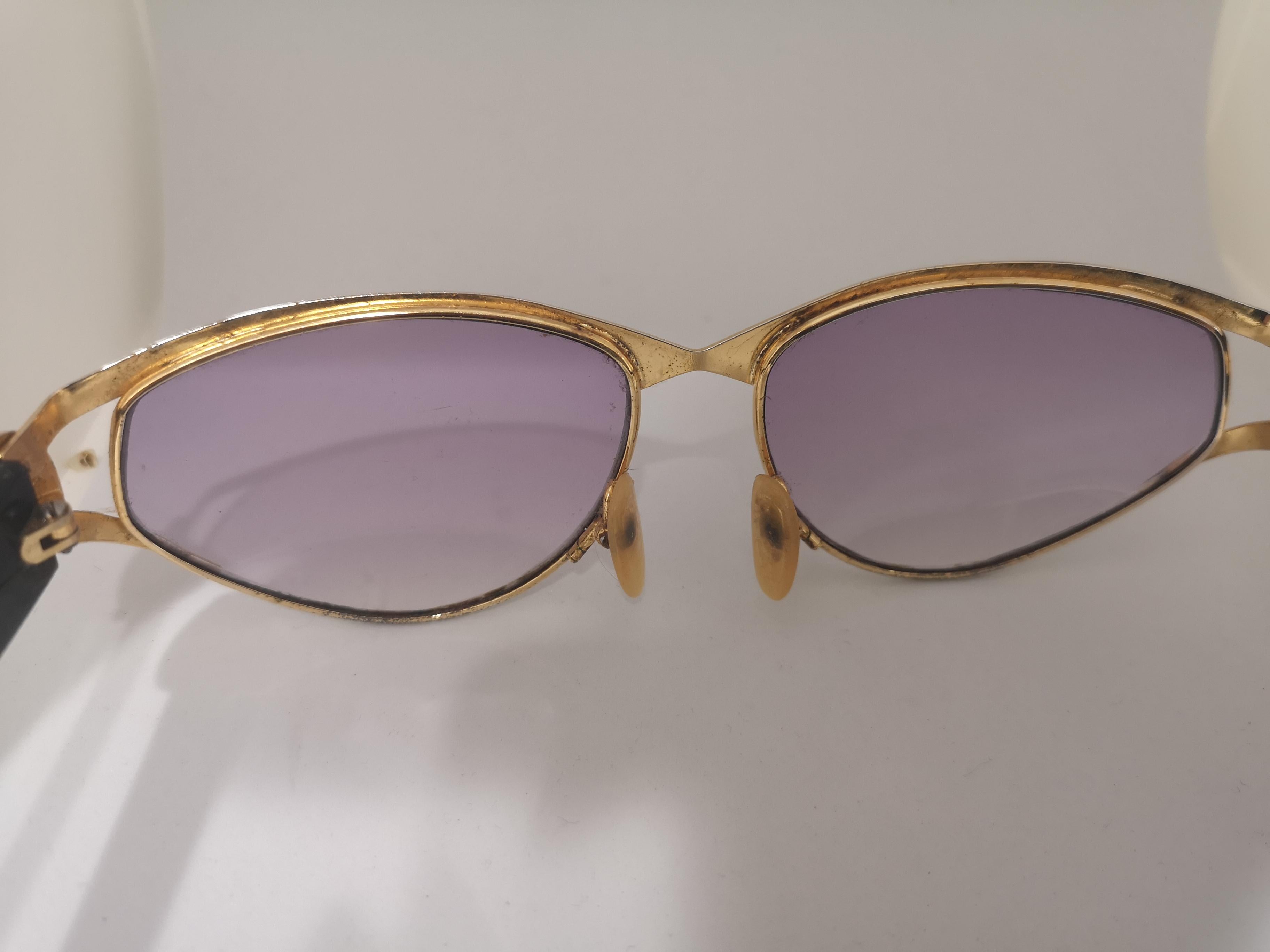 Women's Laura Biagiotti purple lens gold black sunglasses