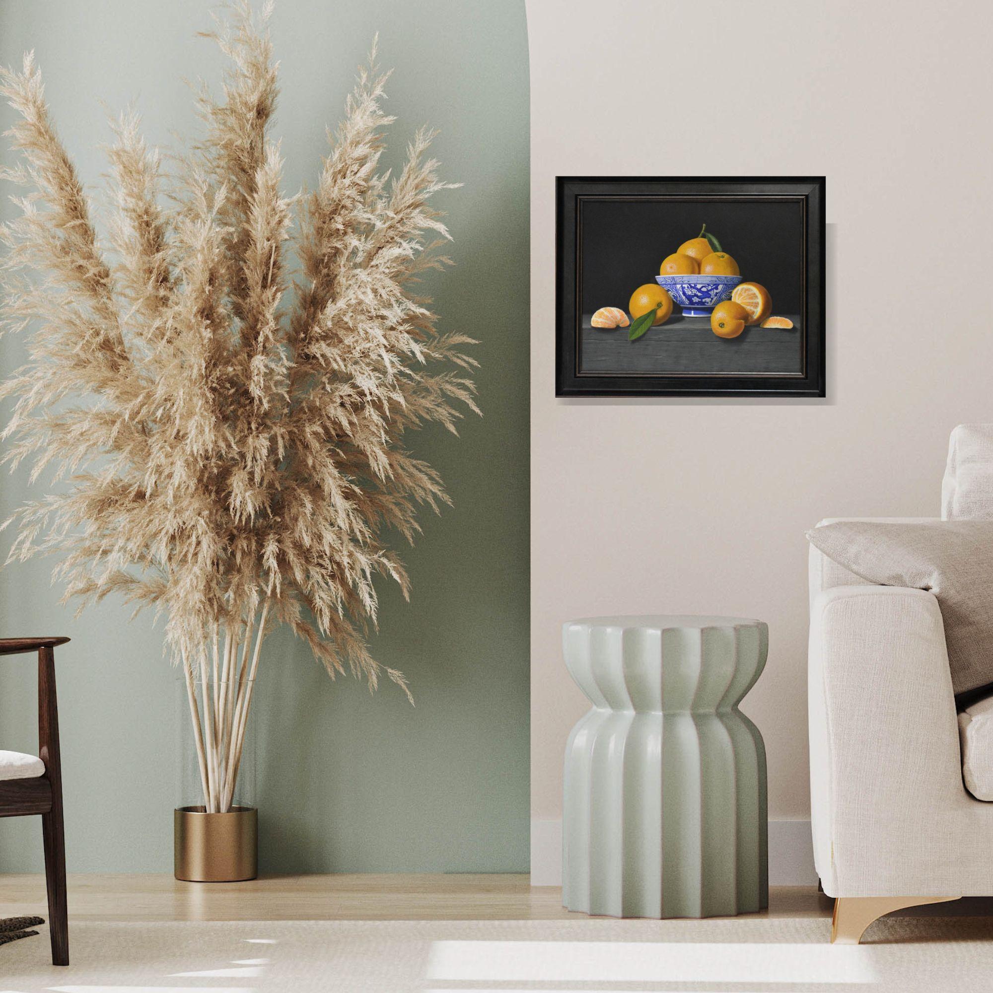 This exceptional artwork is currently on display and available for sale at Signet Contemporary Art Gallery and online.

“Oranges in a blue Bowl” by Laura Critchlow is an exquisite still life that brings everyday beauty into sharp focus. Painted in