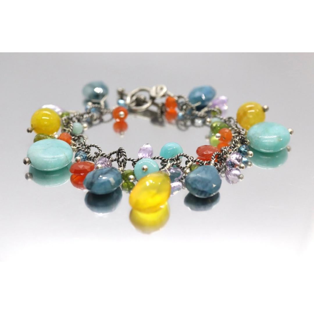 Vintage
Materiali: Pietra
Pietra preziosa: Amazzonite

Larghezza bracciale: 15 millimetri; Lunghezza bracciale: 7,25 pollici

Incredibile bracciale di Laura Gibson & Gibson. Maglie e chiusura in argento sterling. Dolci gemme di caramelle che