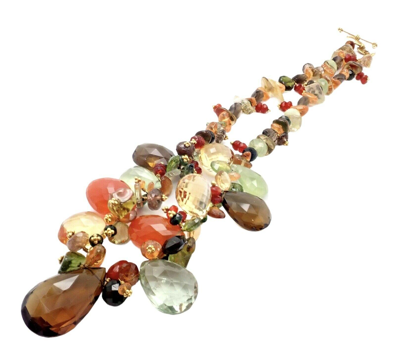 22k Yellow Gold Briolette Onyx Orange Spessartite Candy Bead Necklace By Laura Gibson.
With 2 Large Orange Spessartite Garnet: 15mm x 17mm, Large Quartz, Aquamarines, and other great large color stones

 Details:
 Length: 16.5