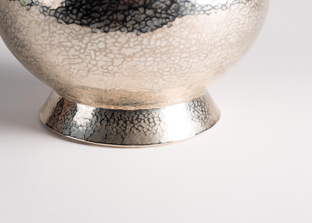 One of a series of beautiful, lobed vases created by American designer Laura Kirar in collaboration with 5th-generation artisans in Michoacan, Mexico. To create these remarkable pieces, raw copper is heated and hand hammered into shape before adding