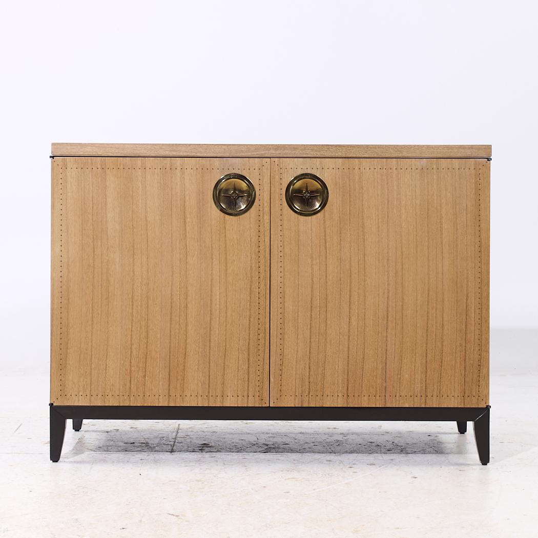 Laura Kirar for Baker Arca Chest Cabinet Credenza

This credenza measures: 48 wide x 20.25 deep x 35 inches highWe take our photos in a controlled lighting studio to show as much detail as possible. We do not Photoshop out blemishes.

CONDITION: