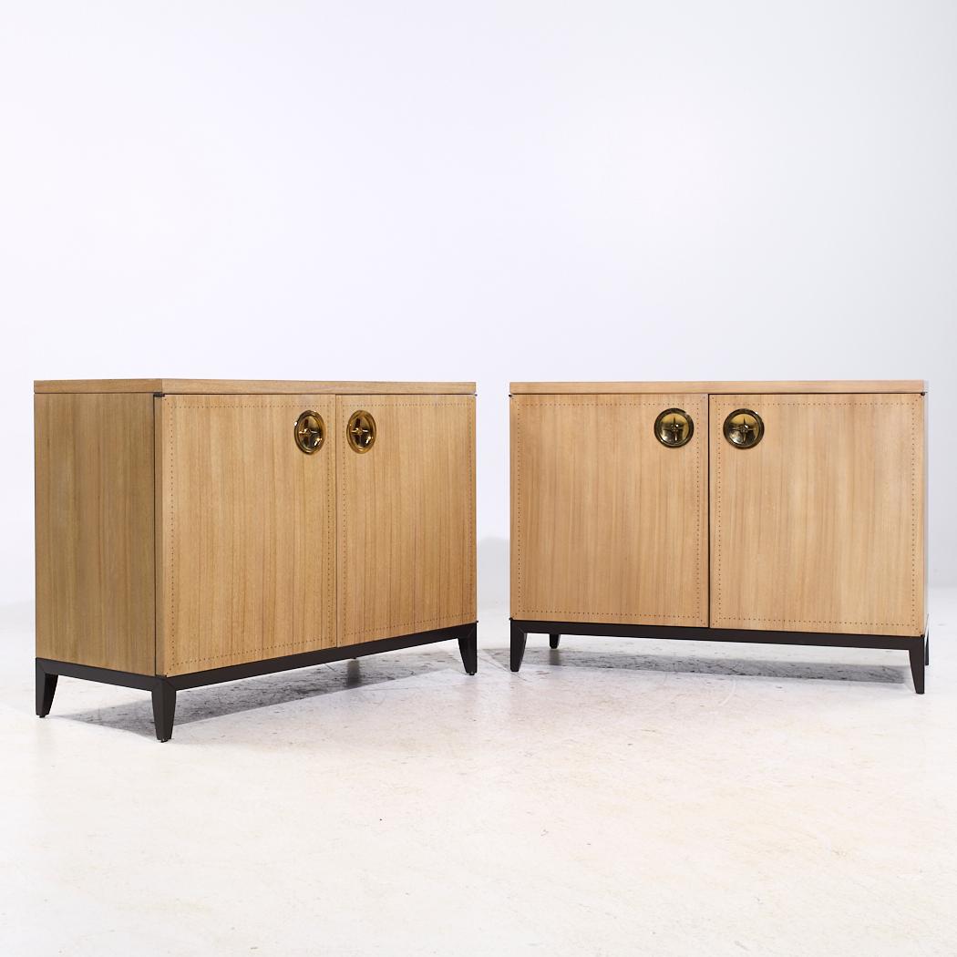 Laura Kirar for Baker Arca Chest Cabinet Credenza - Pair

Each credenza measures: 48 wide x 20.25 deep x 35 inches highWe take our photos in a controlled lighting studio to show as much detail as possible. We do not Photoshop out