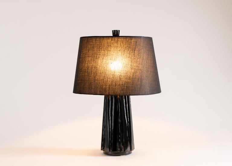 With the presence of a work twice its size, this marvelous lamp serves as a perfect example of Laura Kirar's creative process, which she likens to speaking in tongues. It is by this spiritual process that Kirar wields traditional Mexican materials
