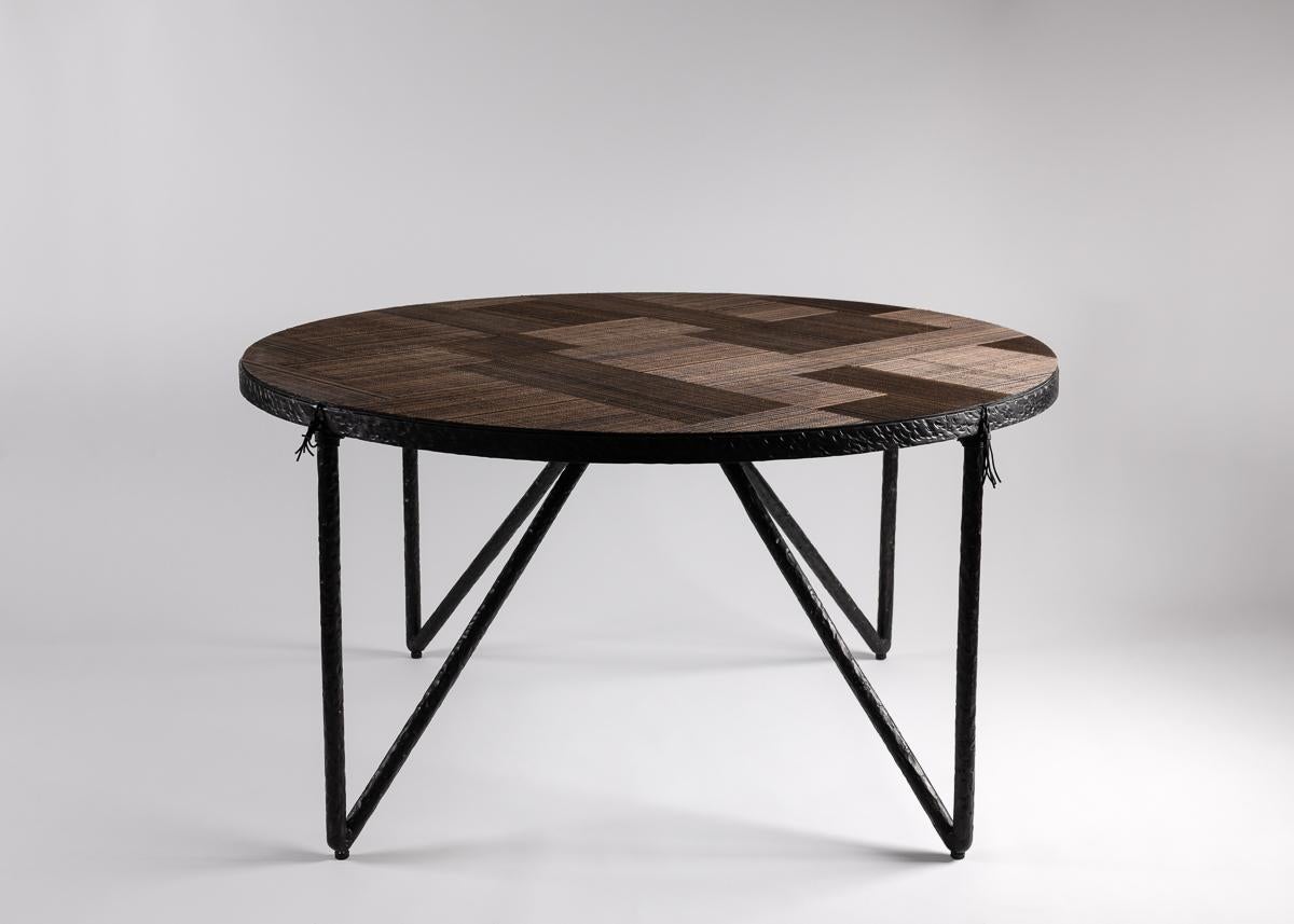 With Parquet, a broad center table with a charming geometric base, Laura Kirar utilizes traditional Mexican techniques and materials in this case lacquered henequen, to produce a chic, consummately modern creation. The result is a table that honors