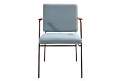 "Laura" Minimalist chair in painted steel with wooden armrests