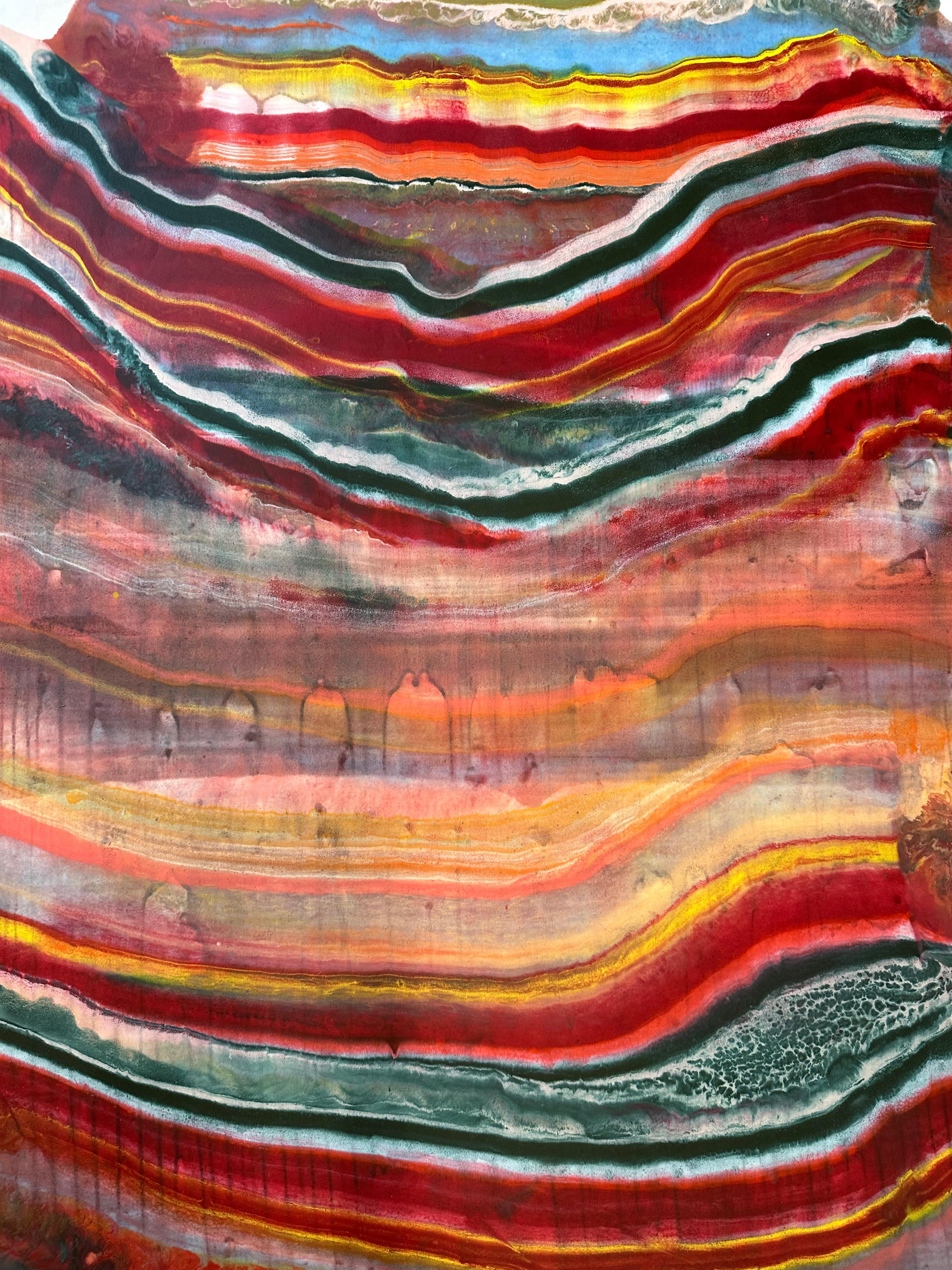 Laura Moriarty's Talking to Rocks 23 is a multicolored encaustic monotype on kozo paper. Layers of pigmented beeswax on lightweight paper create an undulating composition suggesting layers of the earth's crust and geological formations depicted in