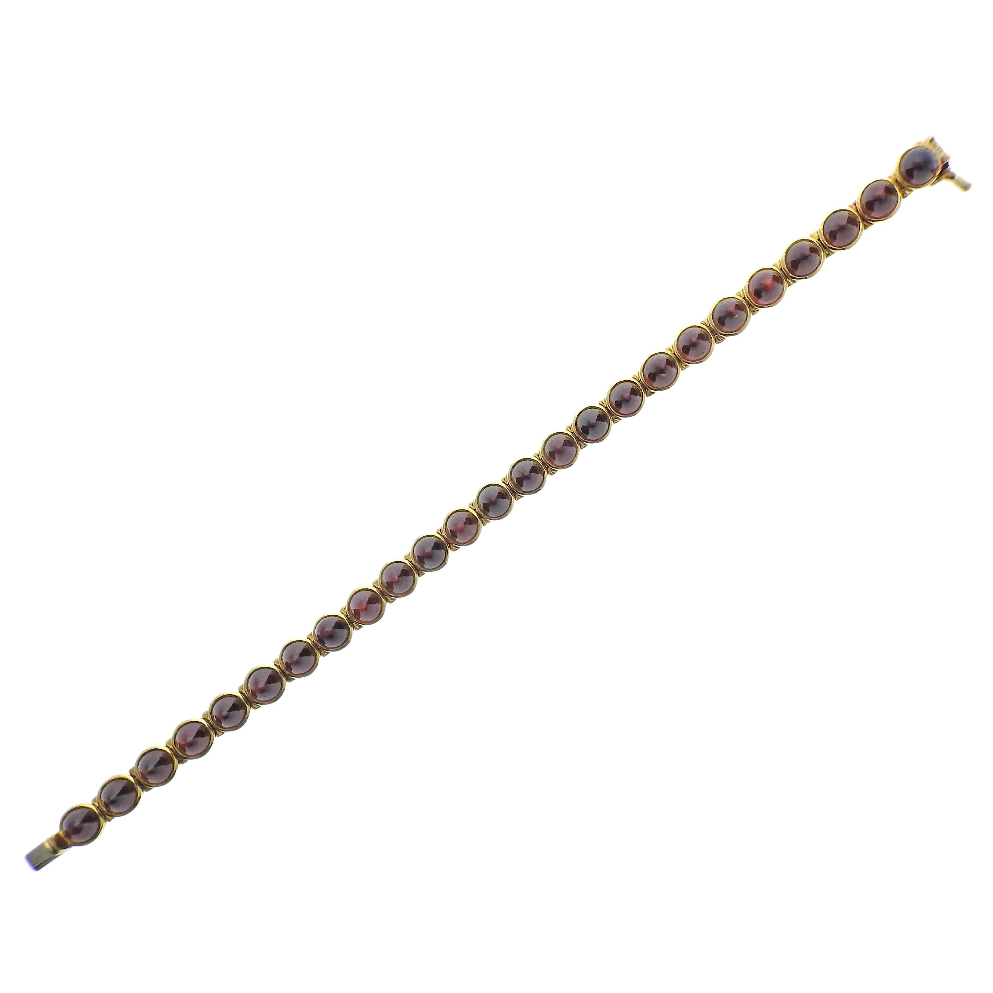Laura Munder Garnet 18k Gold Bracelet. Bracelet measures 7 1/4