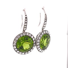 Pendientes Laura Munder de oro blanco y diamantes peridotos