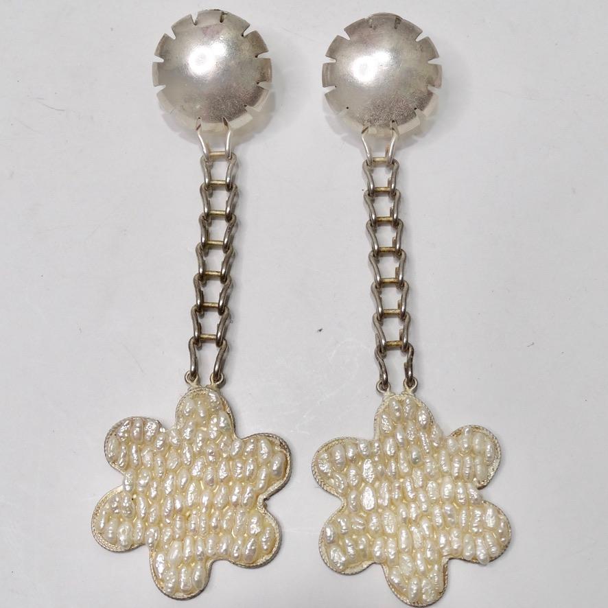 How stunning are these Laura Vogel 1960s drop earrings with the most beautiful pearly flowers? Incredible drop style earrings feature sterling silver studs with a chain dangling from them completed with white mother of pearl embroidered flowers as