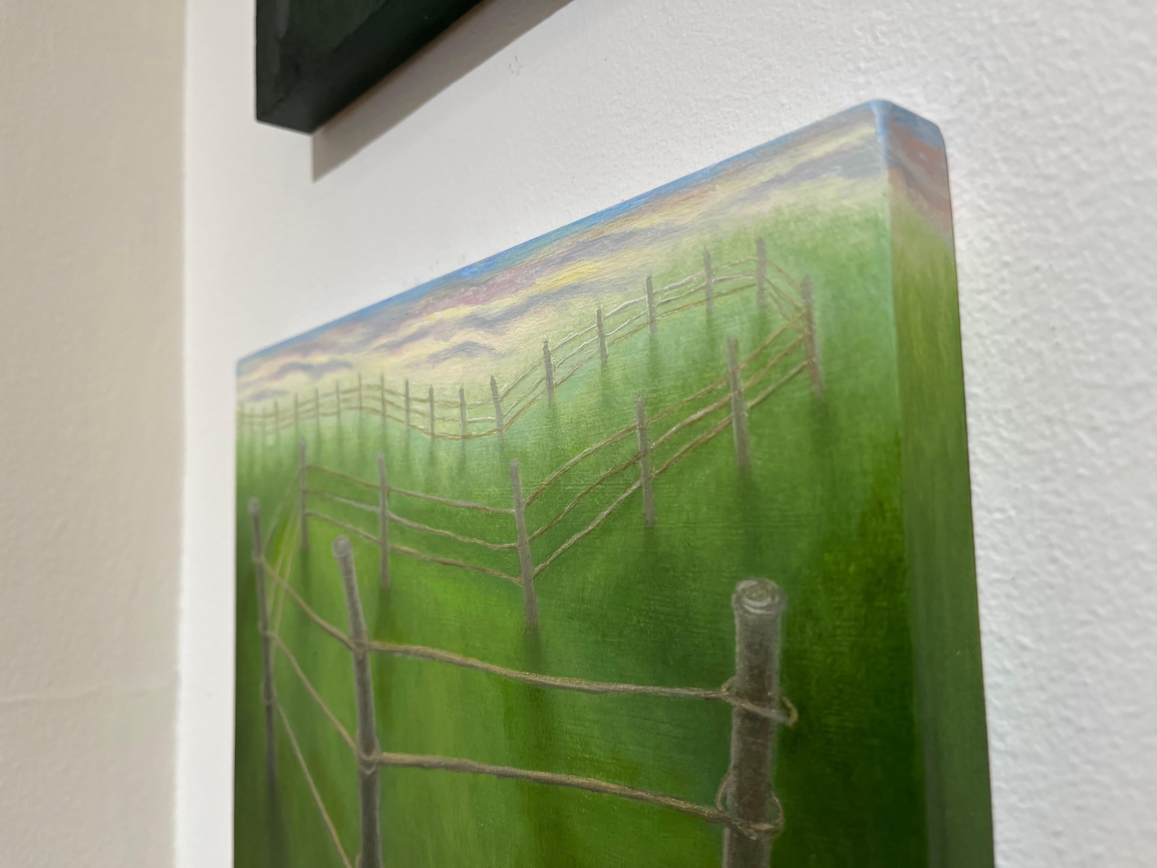 Up & Up, Paesaggio surreale con recinzione tortuosa e campo erboso verde - Painting Realismo americano di Laura Von Rosk