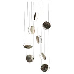 Lámpara de suspensión Laurameroni "Clis Ocho" con tapas intercambiables