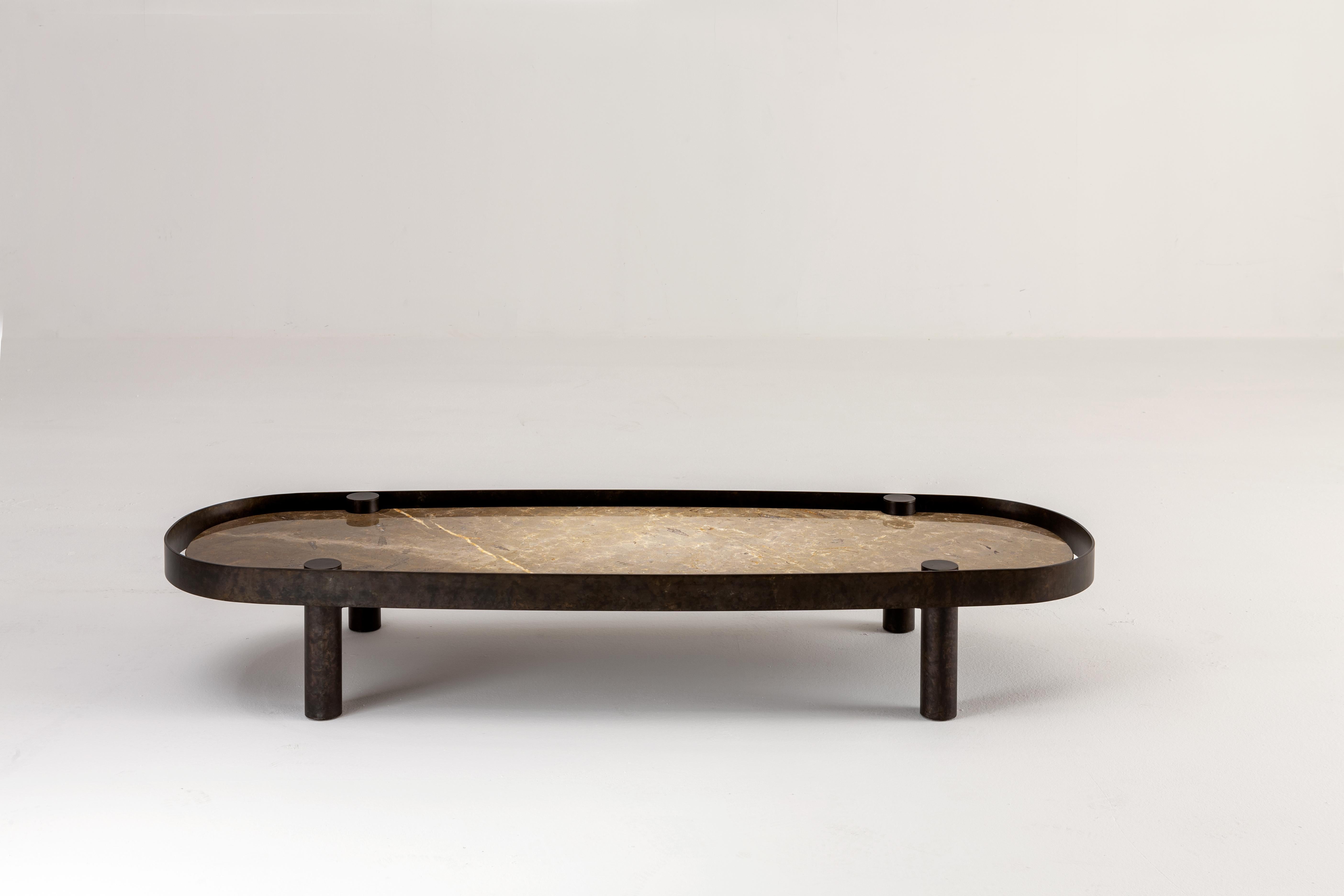 Low elliptical coffee table with 