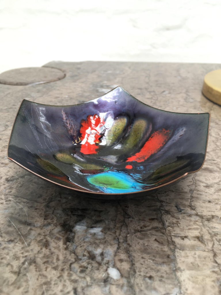 Lustrous deep colors in this fine Brutalist pentagonal enamel dish by Franco Bastianelli for Laurana Rame d'Arte, dating from the 1970s.

Multiple hairline cracks, as often happens with copper enamel work, however they don't detract from the