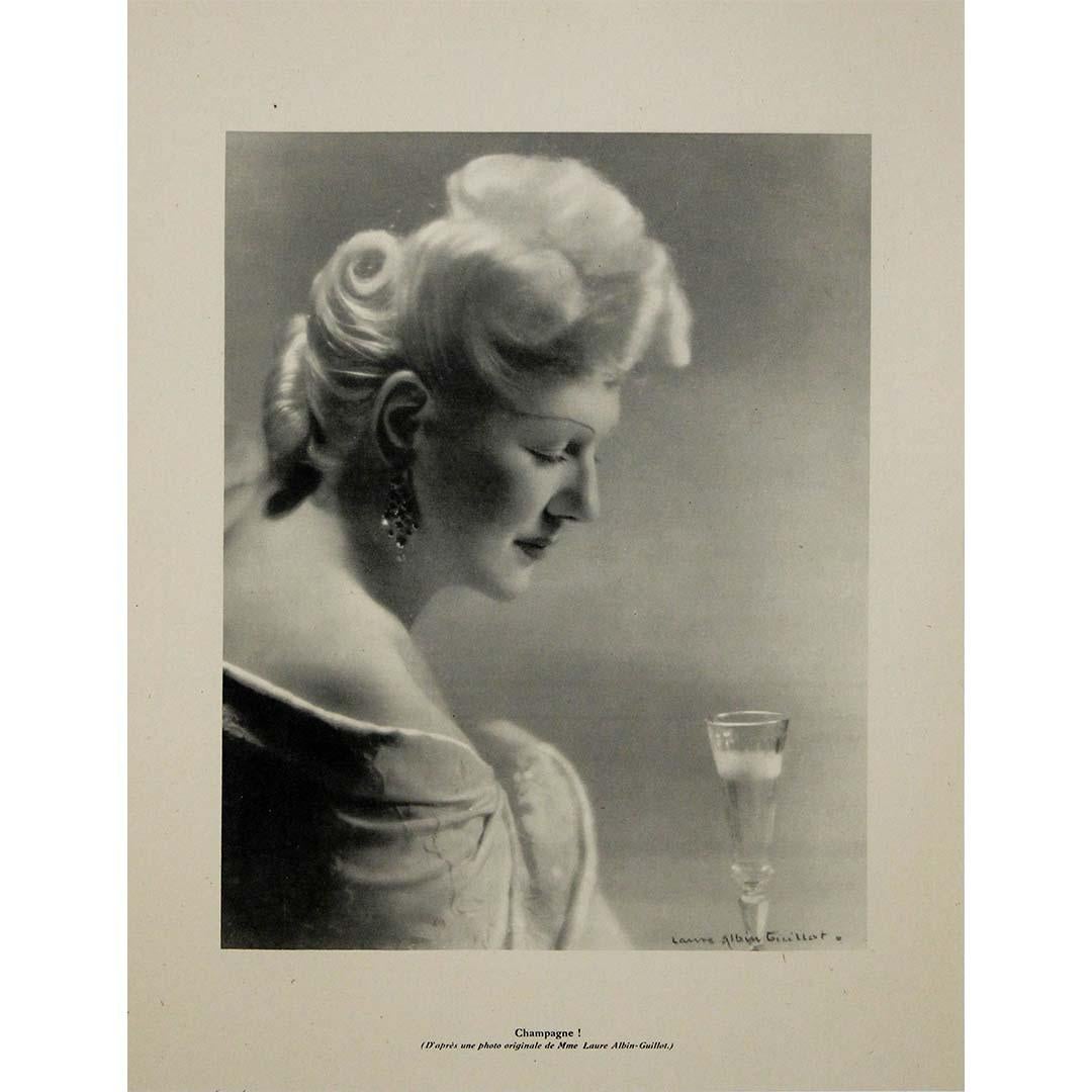 This original 1944 poster titled “Champagne!” is the work of Laure Albin Guillot, one of the most influential figures in early 20th-century French photography. Known for her refined style and mastery of photographic techniques, Albin Guillot