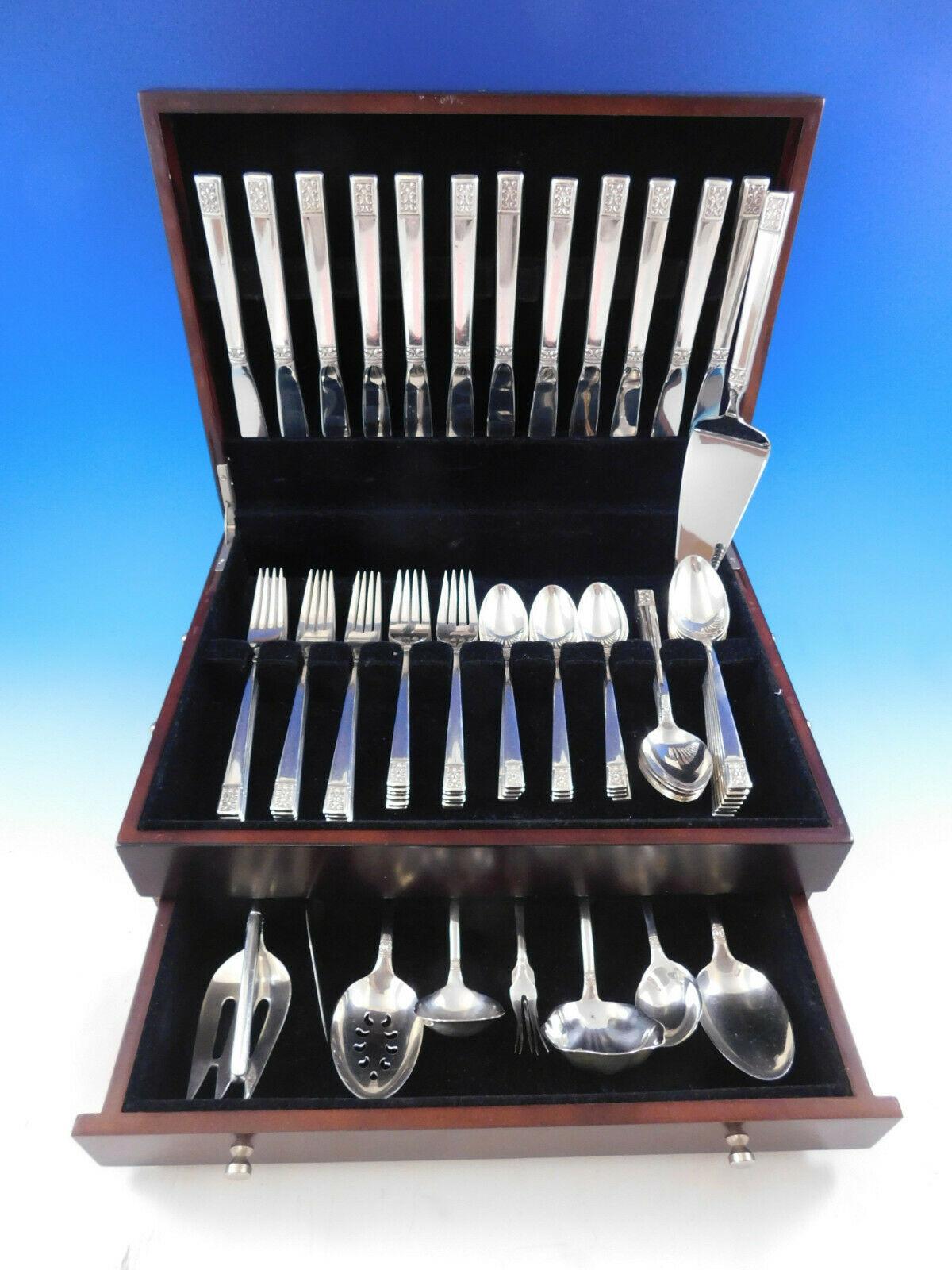 Heirloom quality Laureate by Towle sterling silver flatware set - 71 pieces, circa 1968. This set includes:

12 knives, 8 7/8