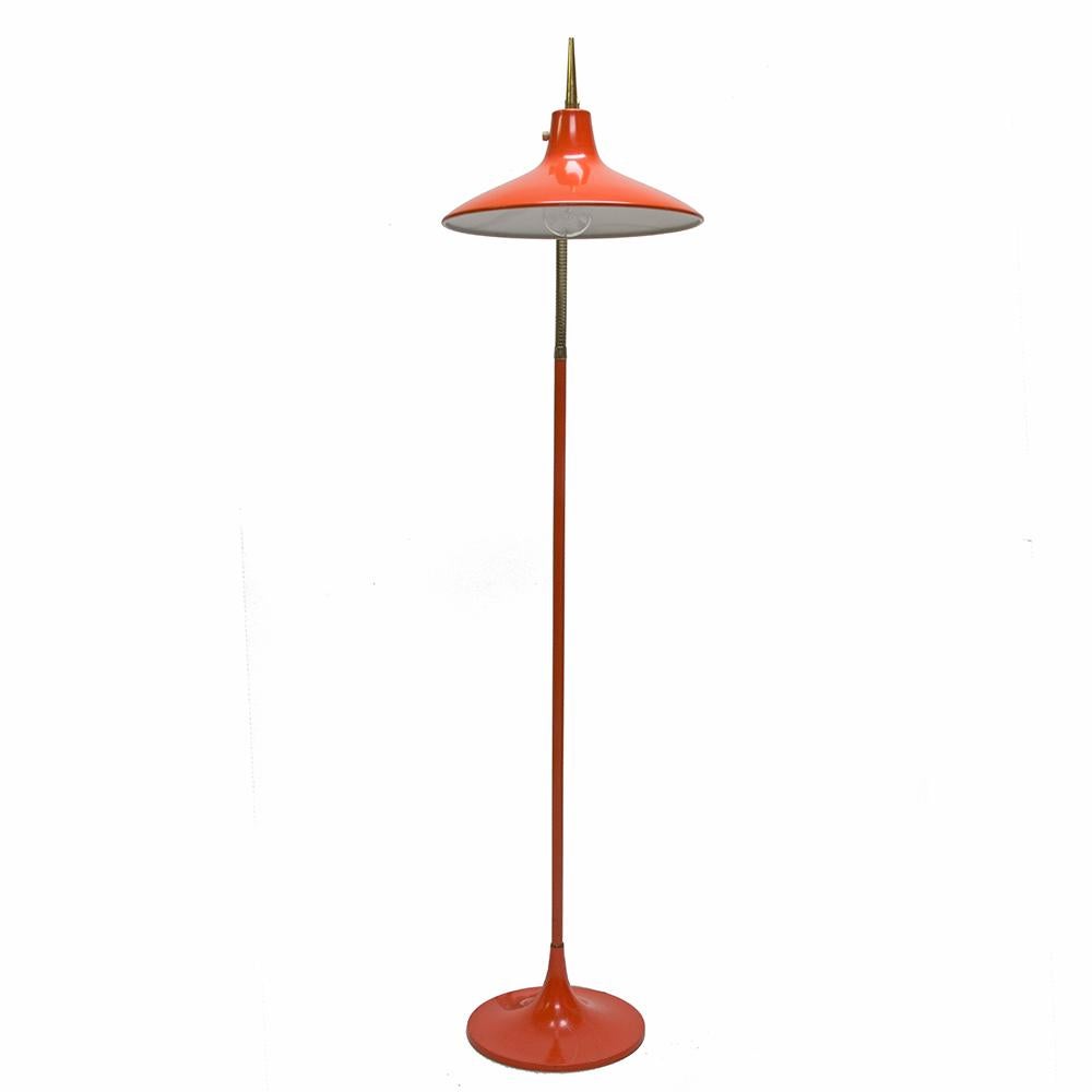 This shapely floor lamp hits all the high notes. Manufactured by the Laurel Lamp Company and retaining its original hallmark sticker, a gorgeous gooseneck silhouette is capped with a shapely dish style shade and capped with a pointed brass finial.