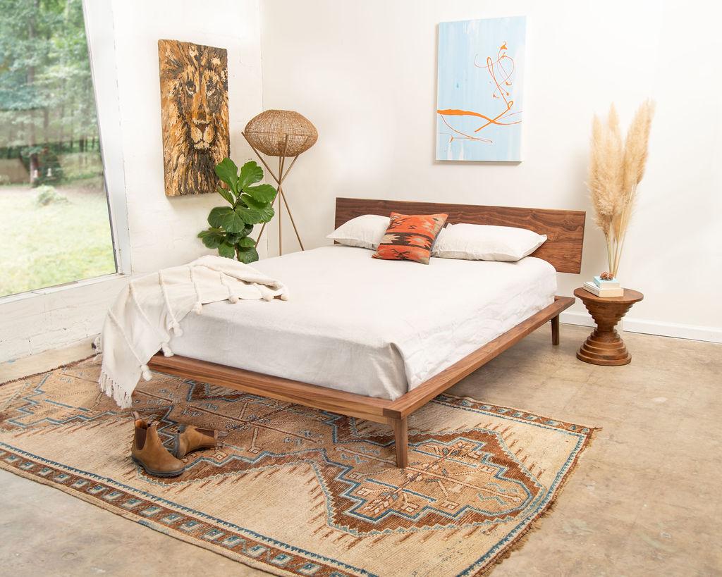 Inspired by Danish simplicity and organic design, the laurel bed features sculpted legs, modest angles, and sturdy joinery. The bed is constructed from North American sustainable walnut with each leg joint hand-filed and shaped to flow seamlessly