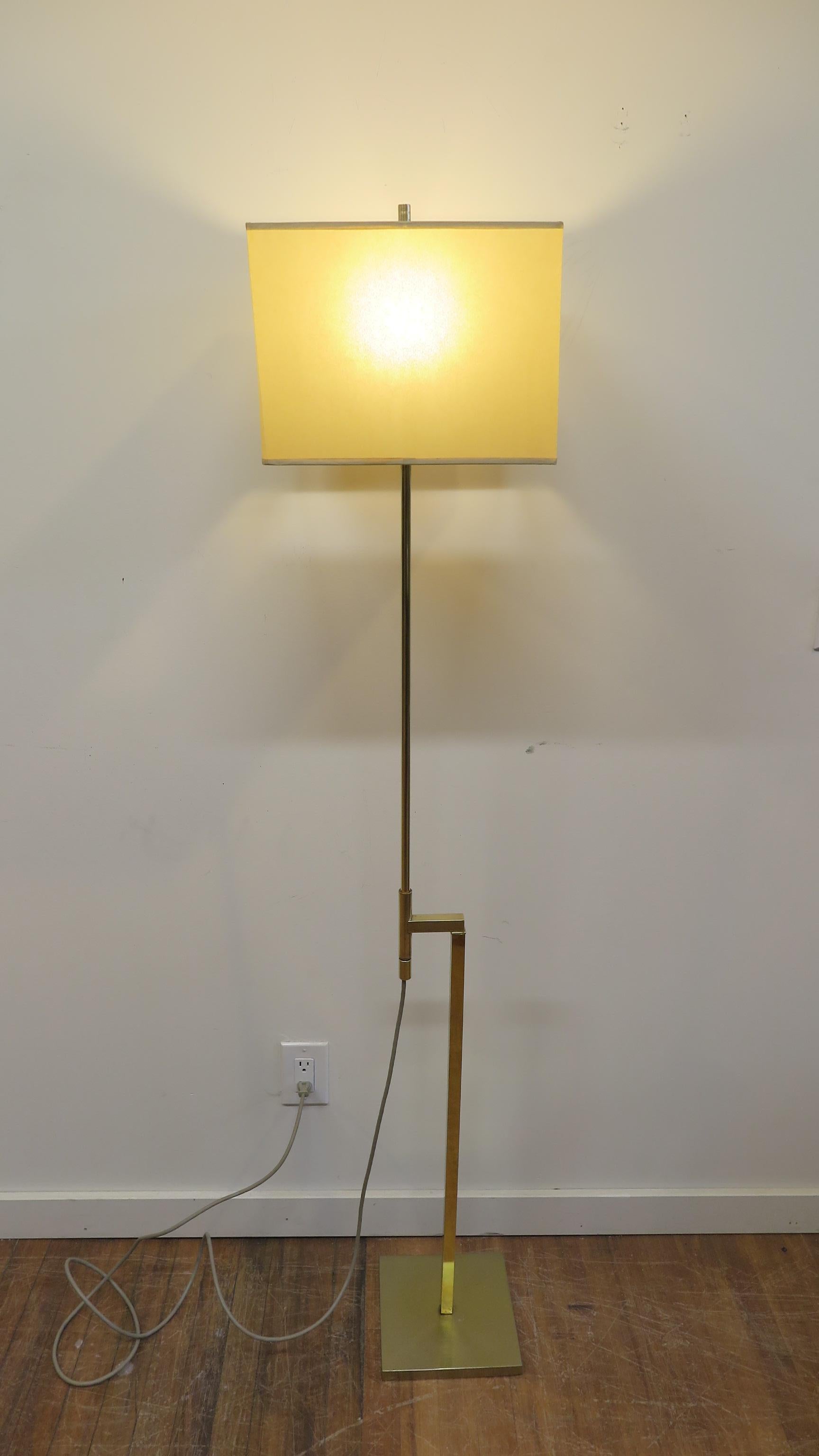 Laurel brass floor lamp adjustable height with built in dimmer. Height can be from 43 to 65 inches. Note solid brass socket with built in dimmer switch LED capable. Height is adjusted by sliding the pole up or down. This lamp is in very good
