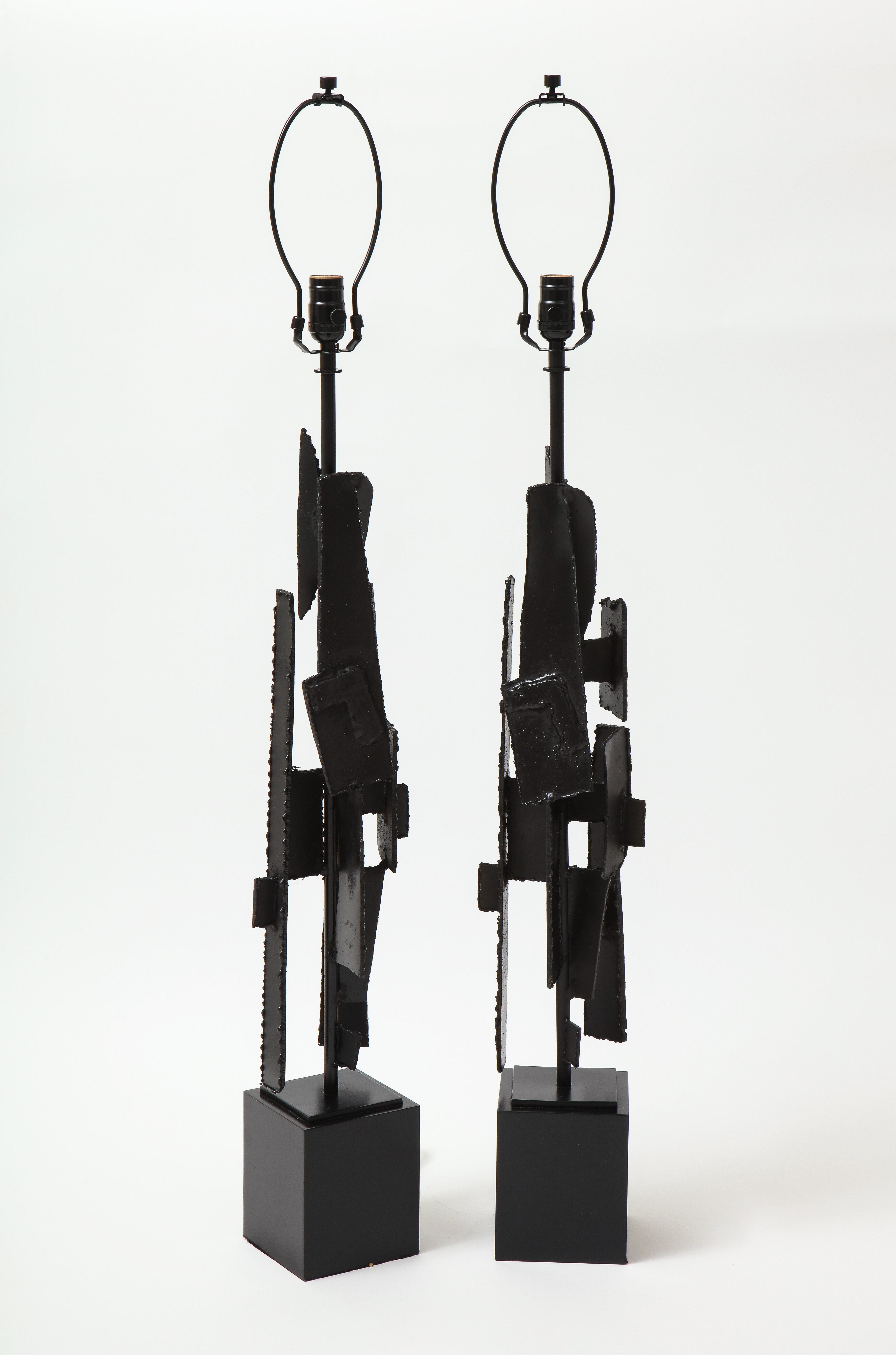 Mid Century/Brutalist torch cut steel sculptural lamps in a black enamel finish. Rewired for use in the USA, 100W max.