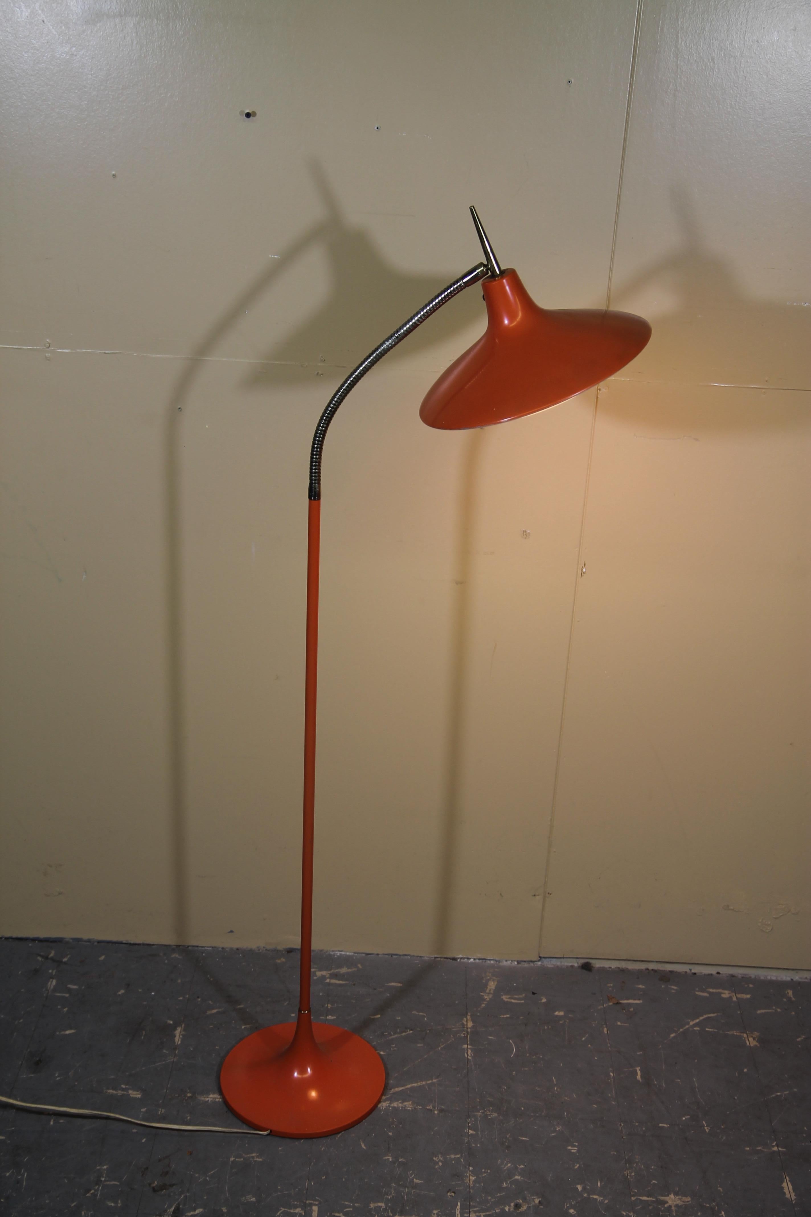 Great orange Laurel floor lamp. Is in great vintage condition. Diffuser has a small area where the plastic is melted. You never see these with the diffuser included intact anymore.
      