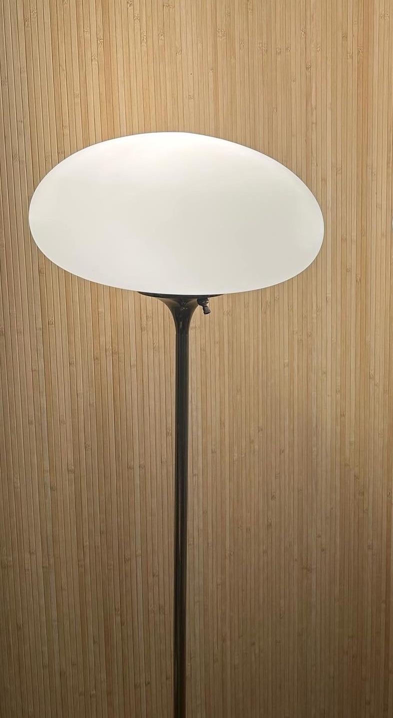 This vintage masterpiece features a distinctive mushroom-shaped frosted shade that exudes an enchanting glow, creating a warm and inviting ambiance in any space.

Crafted with meticulous attention to detail, the Laurel Floor Lamp showcases the sleek